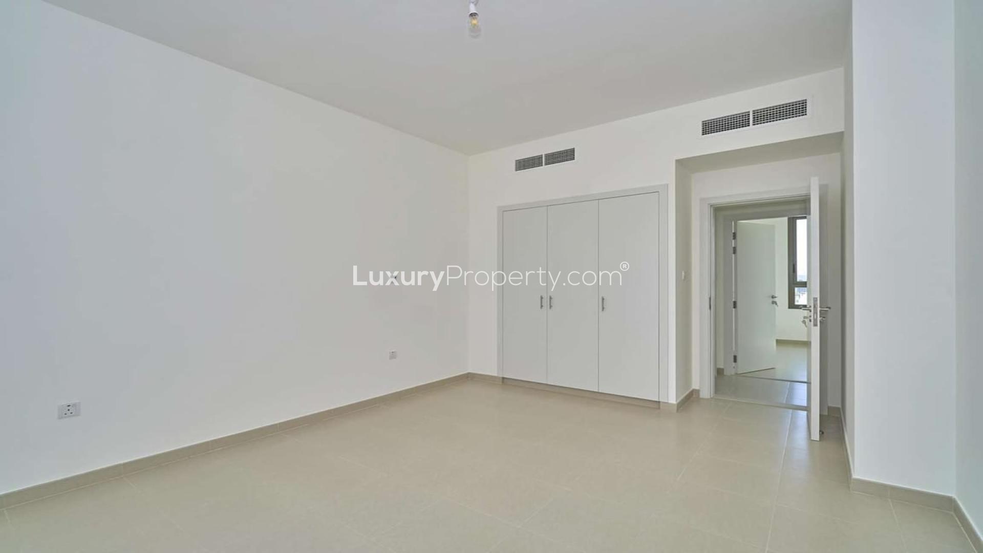 Spacious 4-bedroom townhouse exterior in Naseem Townhouses, Town Square, available for rent
