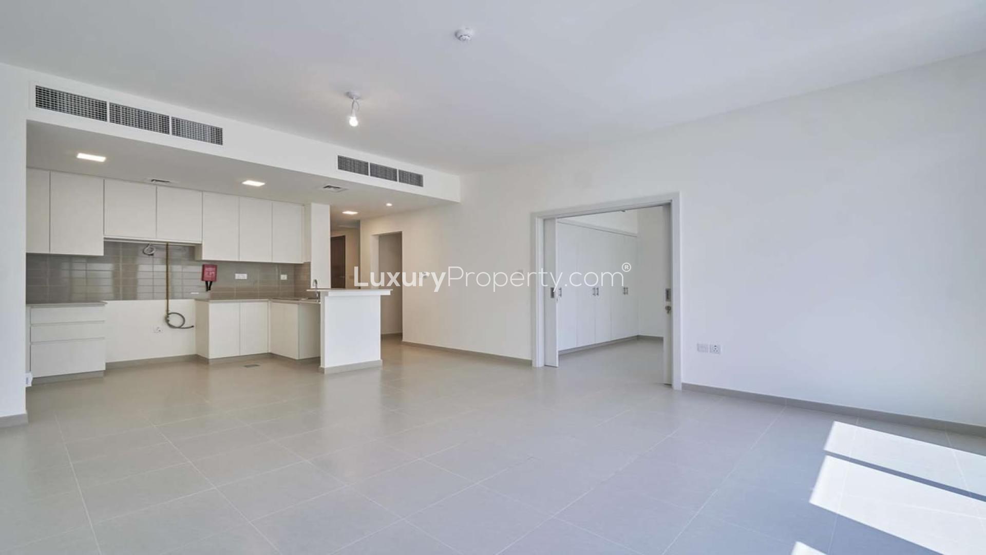 Spacious open-plan kitchen and living area in Naseem Townhouses, Town Square rental
