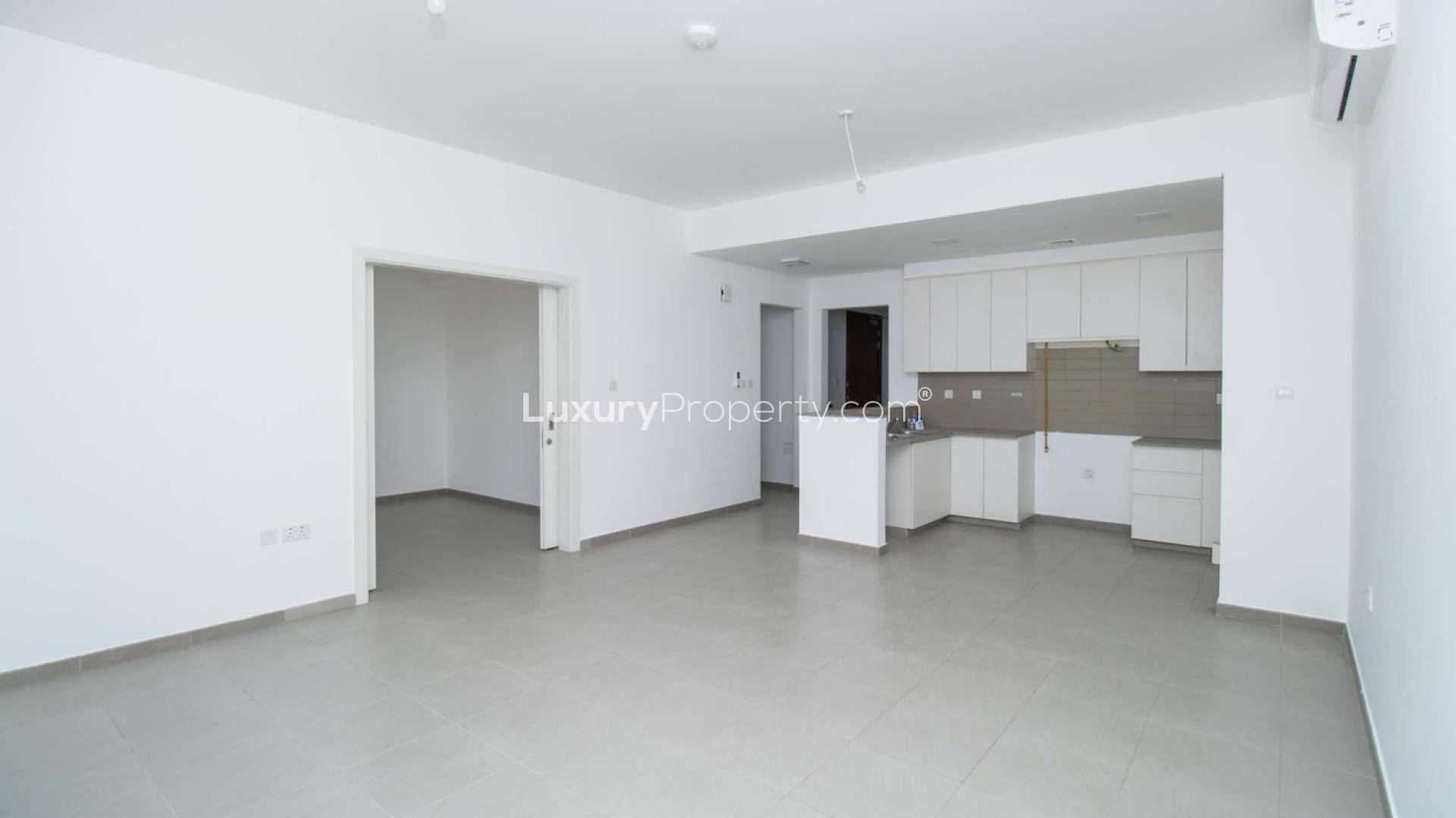 Modern staircase and hallway in Hayat Townhouses, Town Square. Spacious design, bright interiors