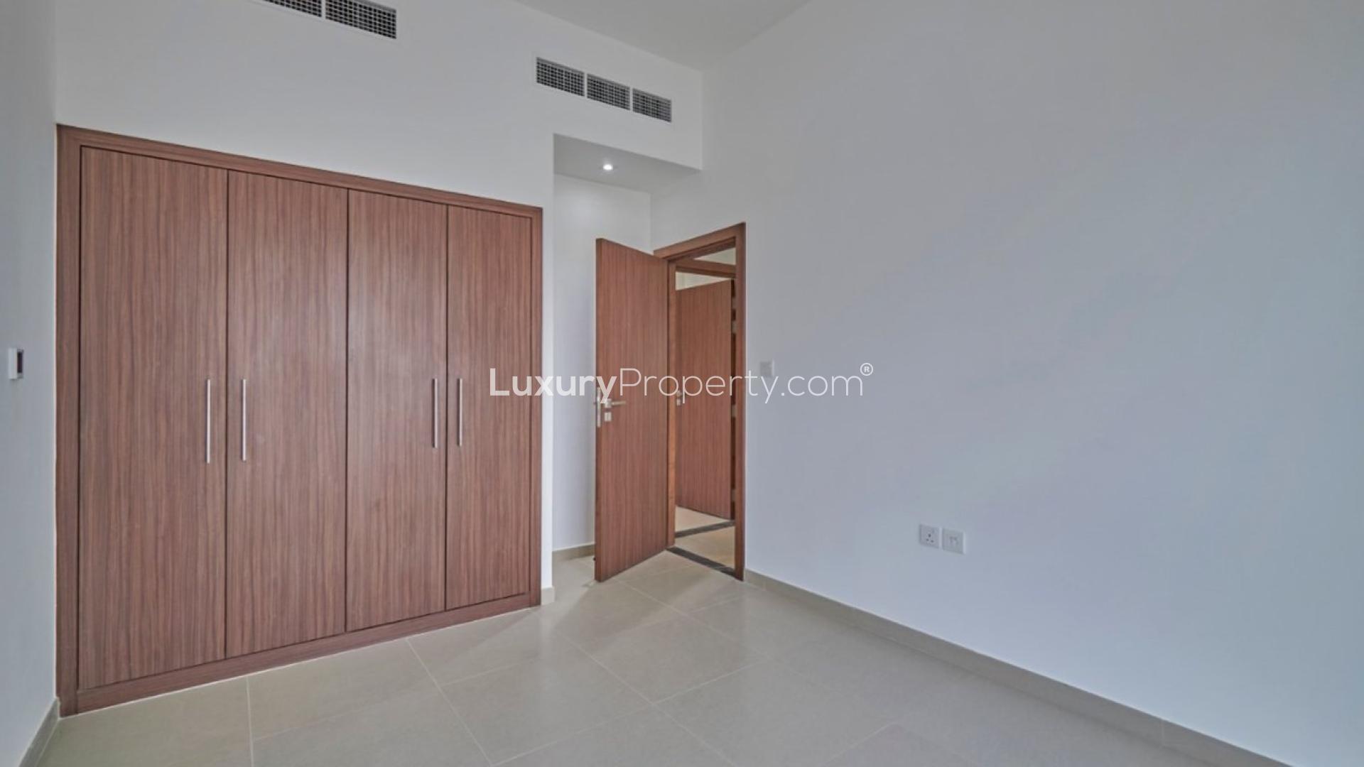 Bright living area with large windows in 4-bedroom townhouse, Arabella, Mudon, for rent