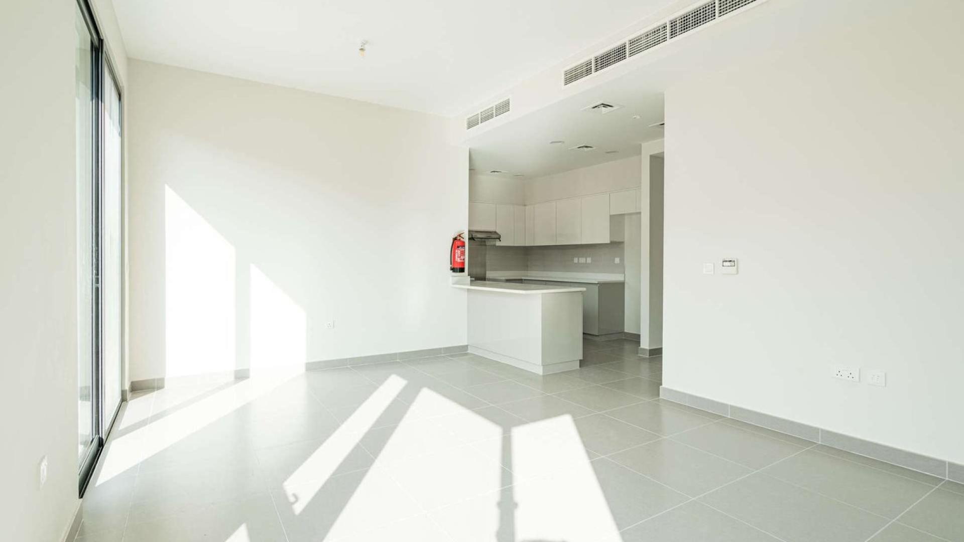 Bright living area with large windows in Maple 2, Dubai Hills Estate townhouse for rent