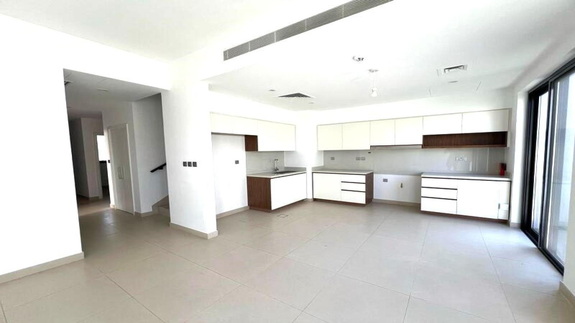 Bright living room with large windows in Camelia townhouse, Arabian Ranches 2