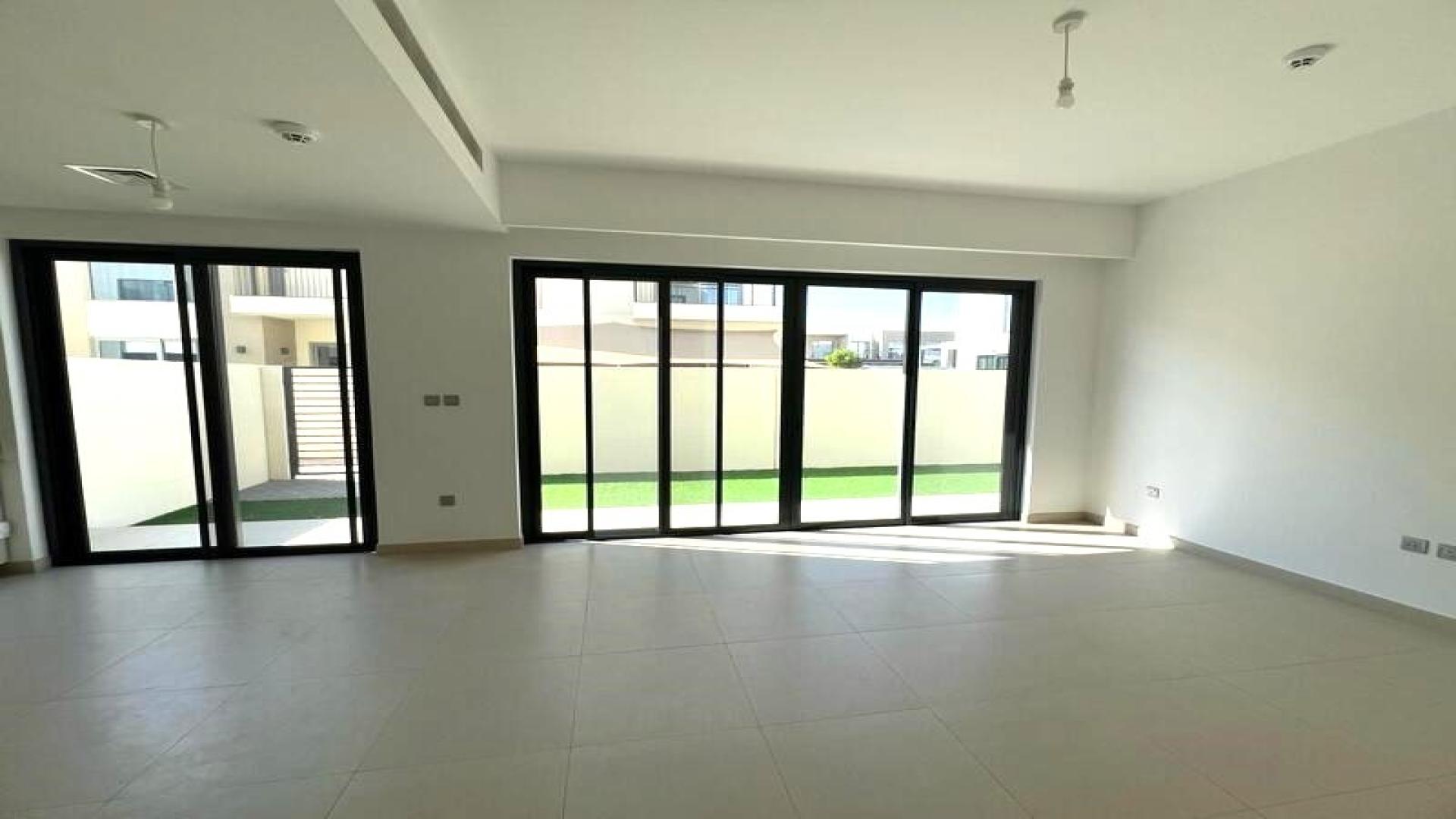 Modern townhouse exterior in Camelia, Arabian Ranches 2, available for rent