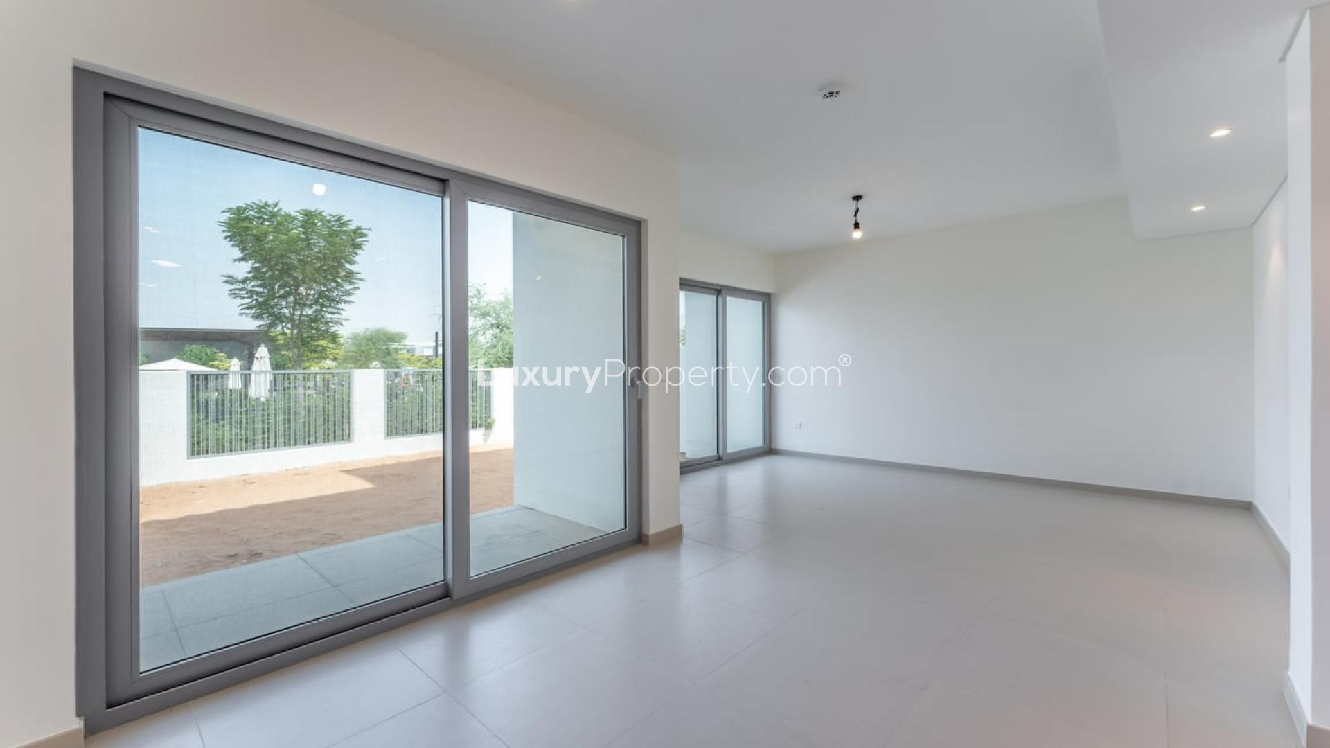 Exterior view of spacious townhouse patio in Elan, Tilal Al Ghaf community