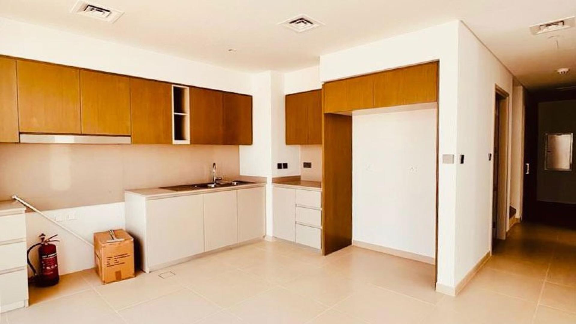 Newly built townhouse living area with large windows in Arabian Ranches 3, Spring