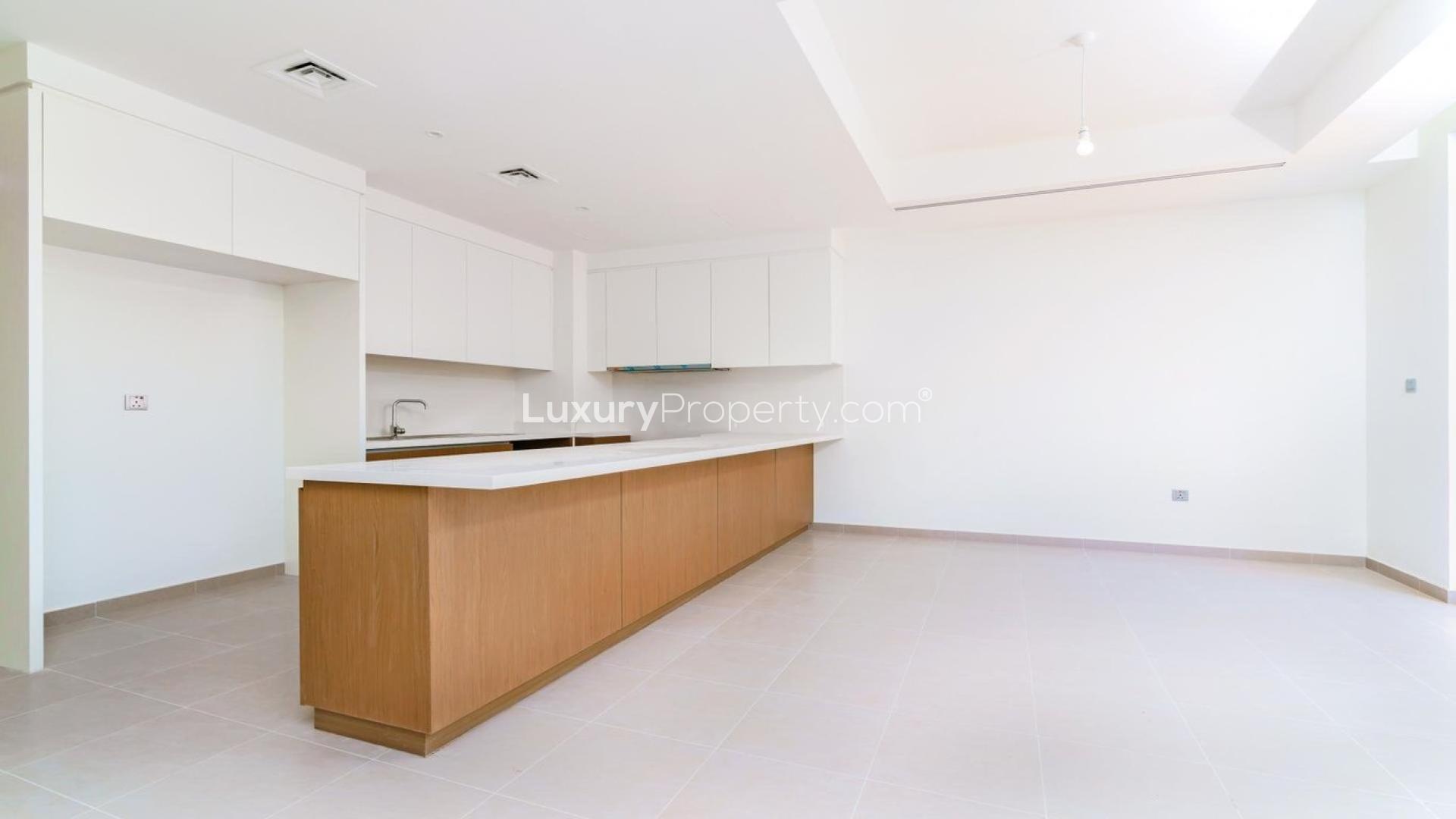 Modern kitchen in well-maintained 4-bedroom Reem townhouse, Arabian Ranches 2, available for rent