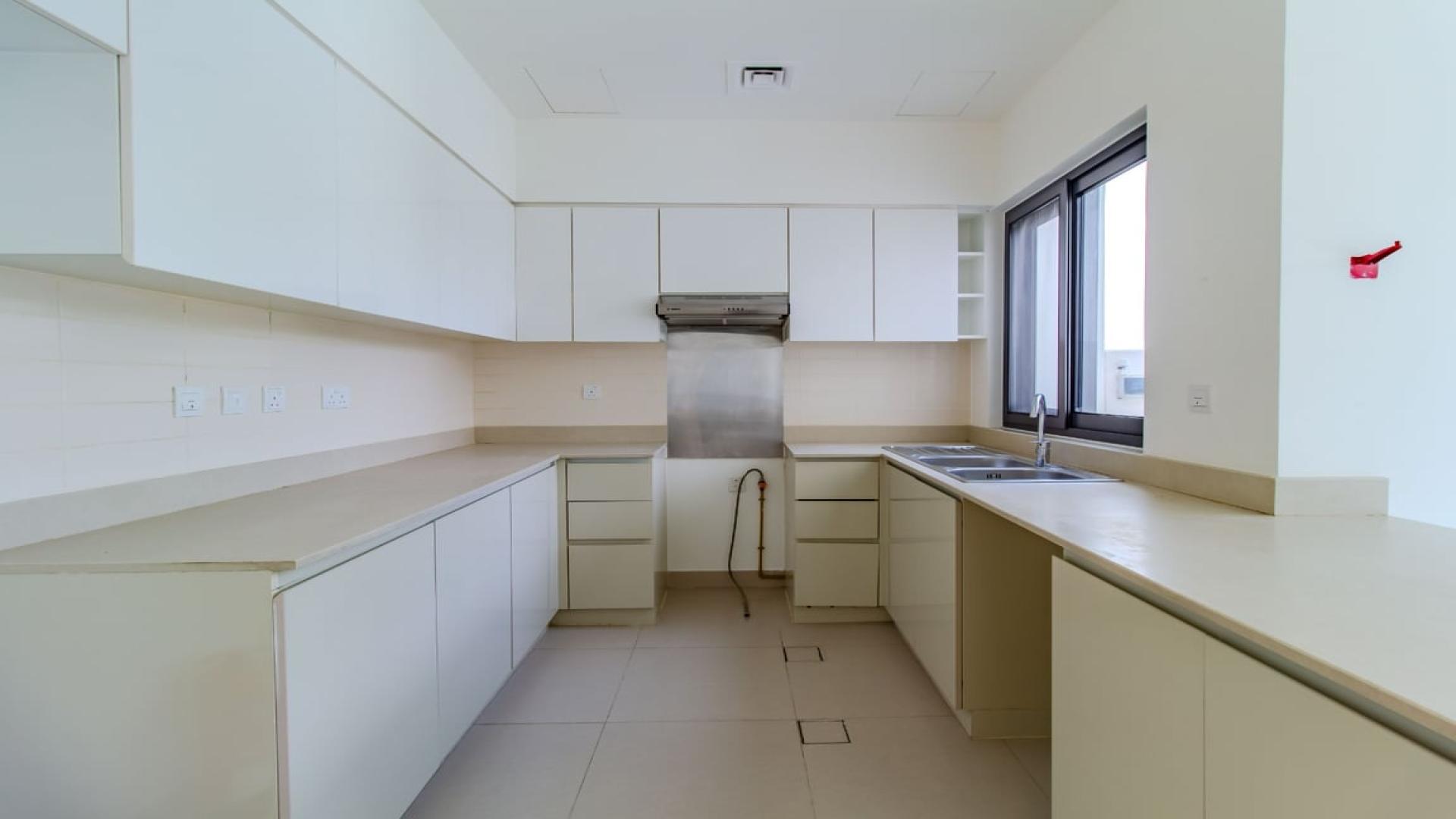 Modern kitchen and living area in 4-bedroom townhouse, Maple, Dubai Hills Estate