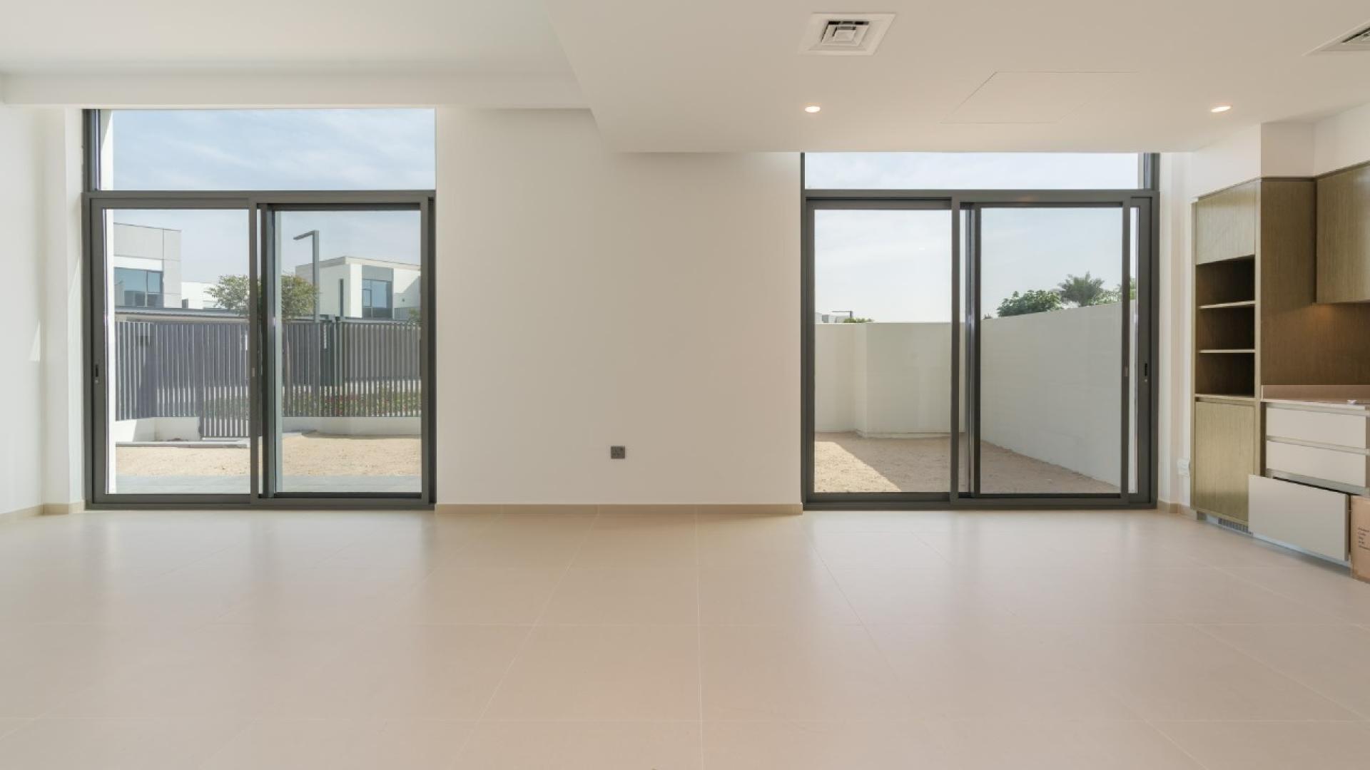 Stylish 4-bedroom townhouse exterior in Joy, Arabian Ranches 3, available for rent