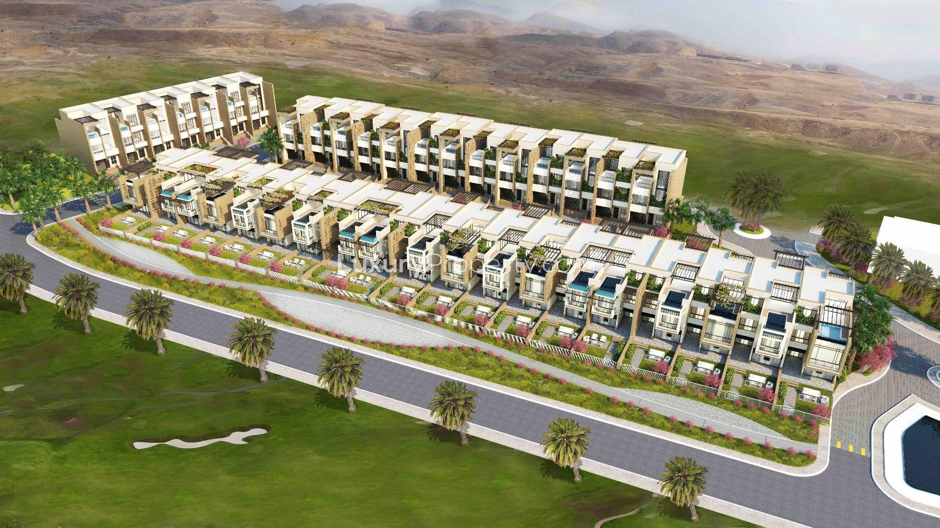 Luxurious 4-bedroom townhouses exterior in Rose Village, Muscat Hills, for sale