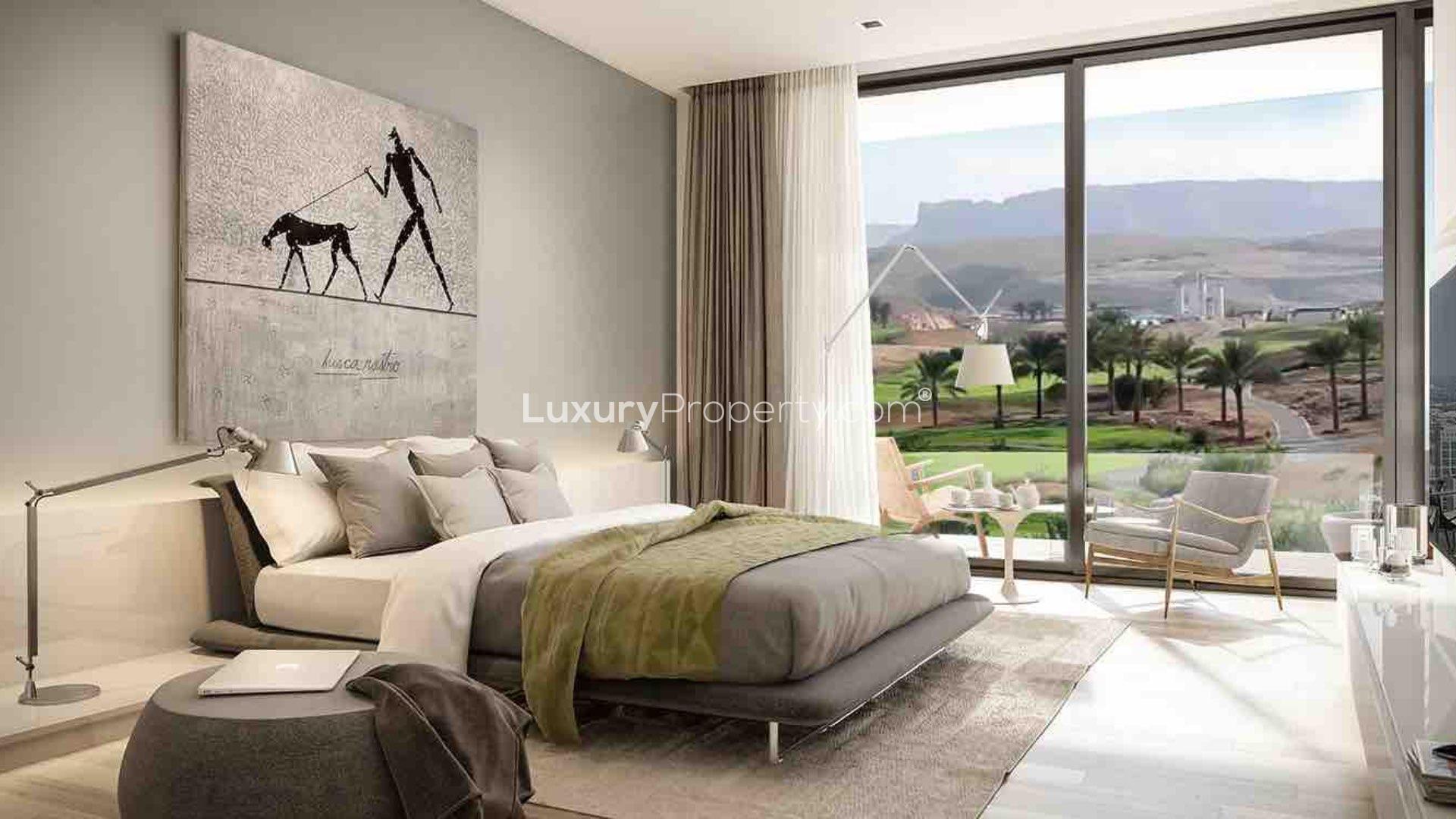 Aerial view of 4-bedroom townhouses in Rose Village, Muscat Hills, near golf course