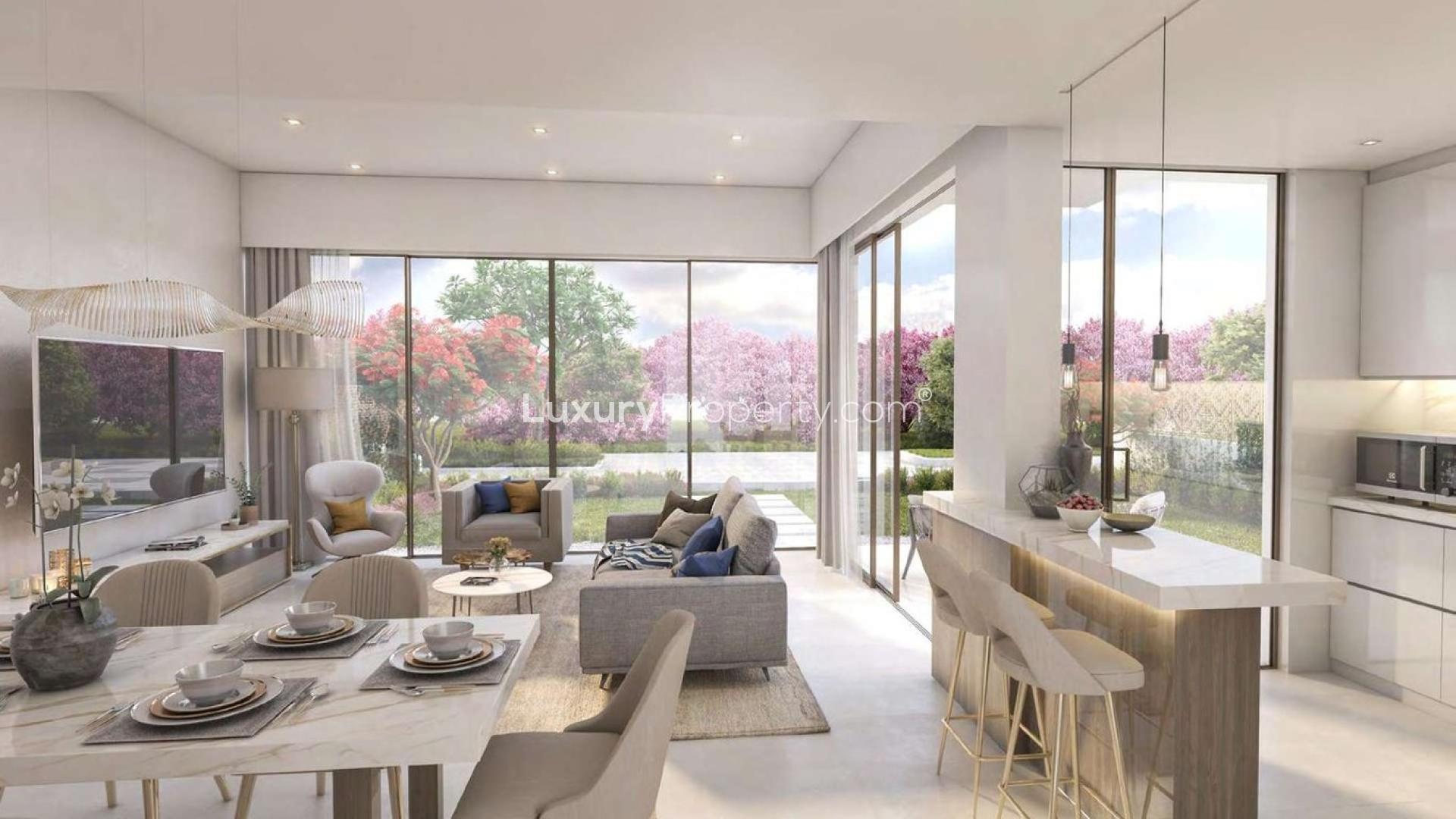 Contemporary 3-bedroom townhouse exterior in Cherrywoods, Dubailand, with driveway and modern design