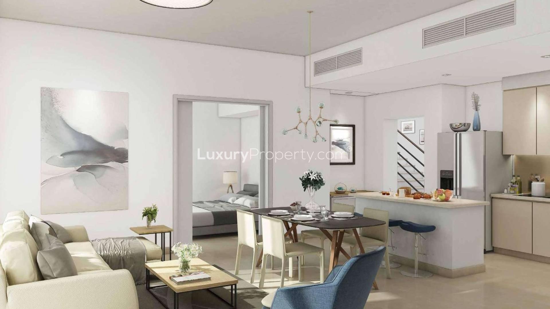 Luxurious Naseem Townhouses street view in Dubai Town Square community, featuring modern architecture