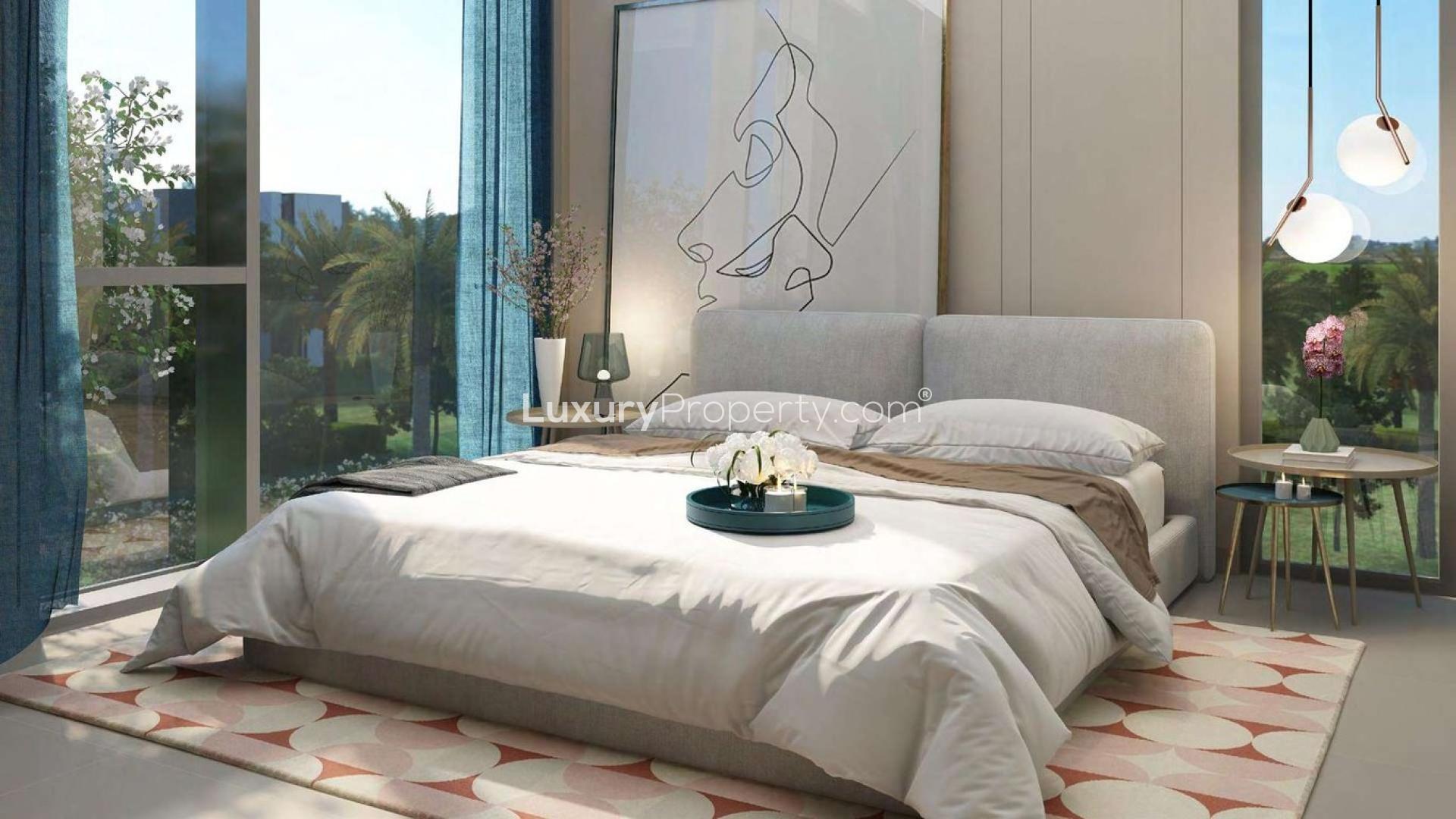 "Modern Spring Townhouses at Arabian Ranches III, spacious design, for sale in Jumeirah Village Circle.",Modern studio bedroom in Spring Townhouses, Arabian Ranches III, with elegant decor and large window