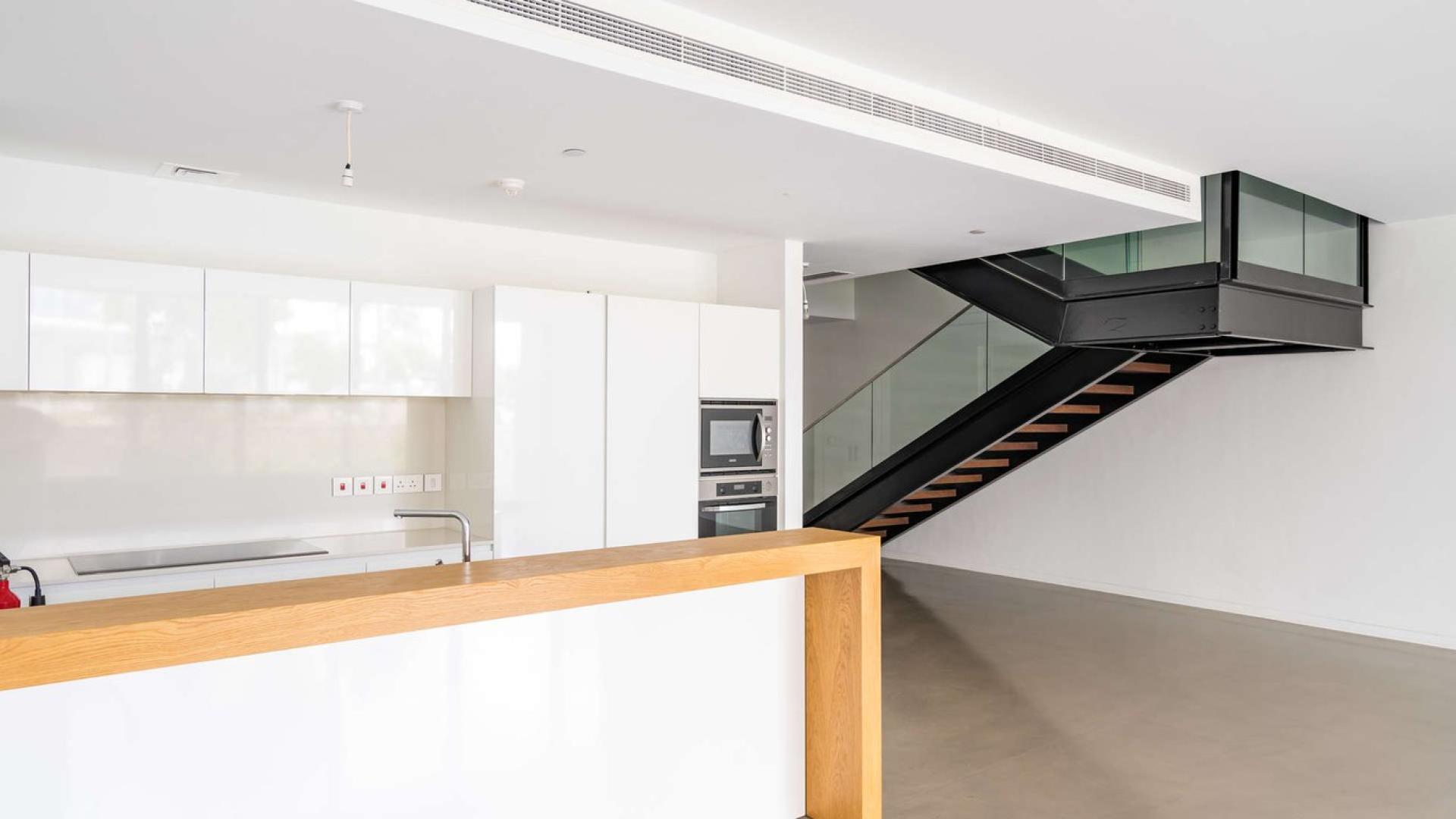 Modern kitchen in luxury four-bedroom townhouse, Nikki Beach, Pearl Jumeirah, for sale