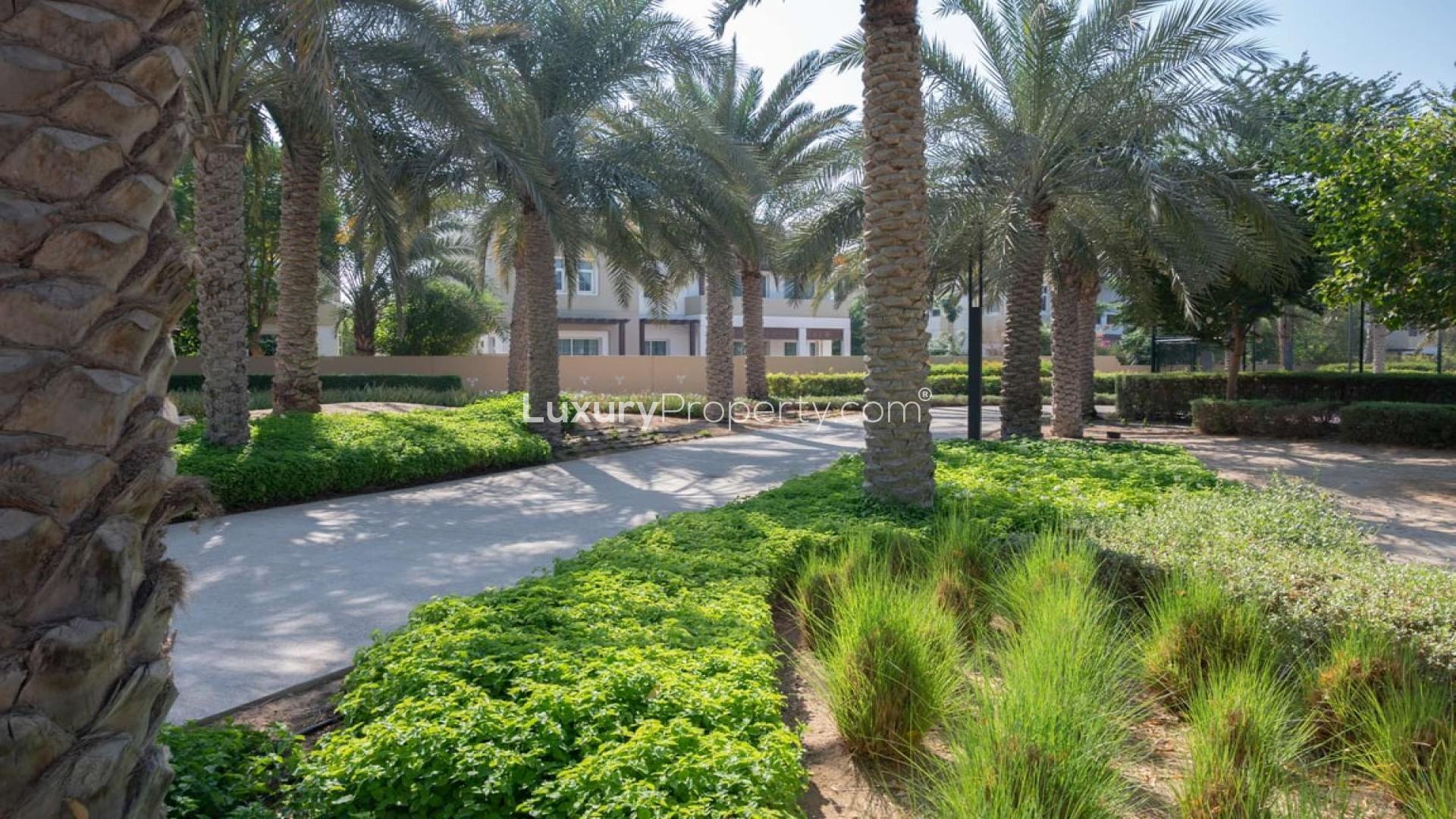 Spacious townhouse terrace in Al Naseem, Mudon with scenic views of greenery and sky