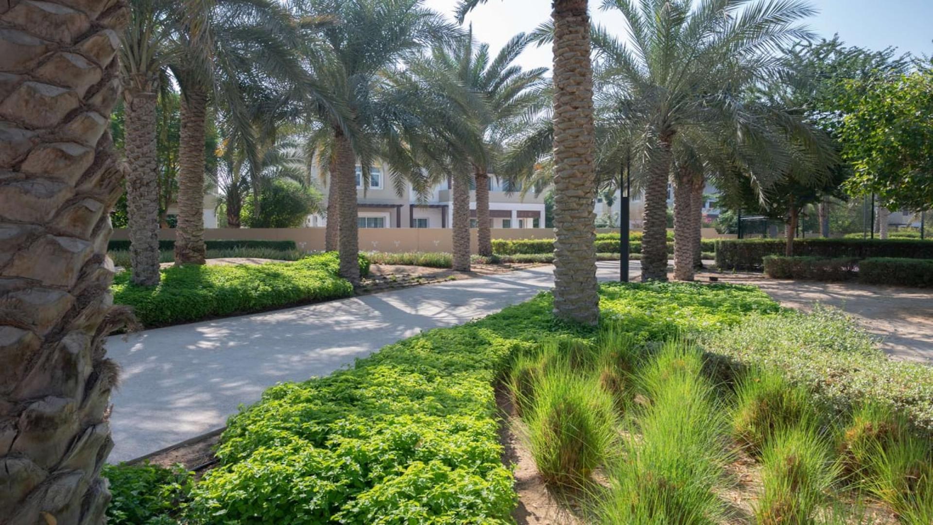 Spacious townhouse terrace in Al Naseem, Mudon with scenic views of greenery and sky