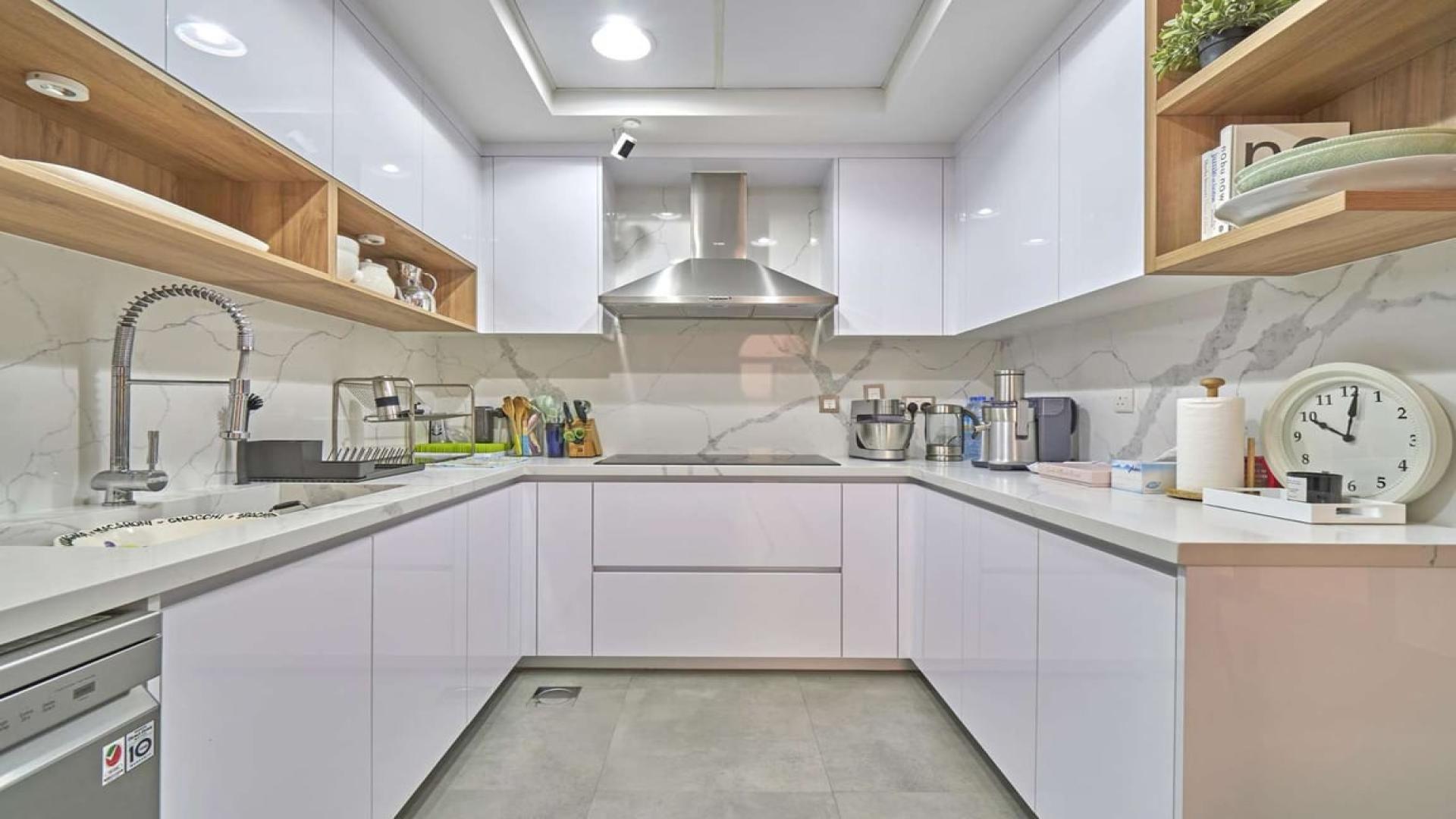 Living room in 4-bedroom townhouse, Al Naseem, Mudon, with elegant decor and natural light