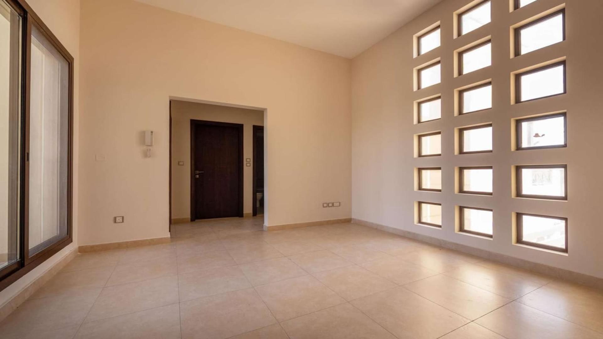 Empty bedroom in spacious townhouse for sale, Mudon Naseem community, four-bed, five-bath
