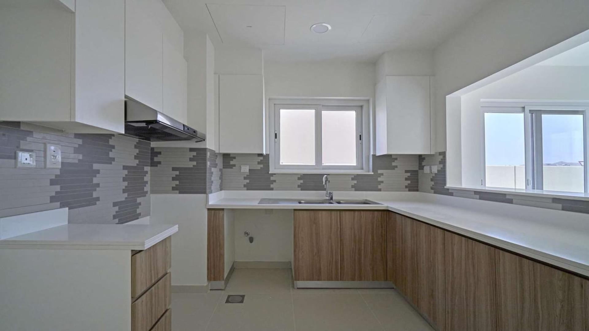 Modern kitchen in brand-new 4-bedroom townhouse, Villanova, Dubai Land, for sale