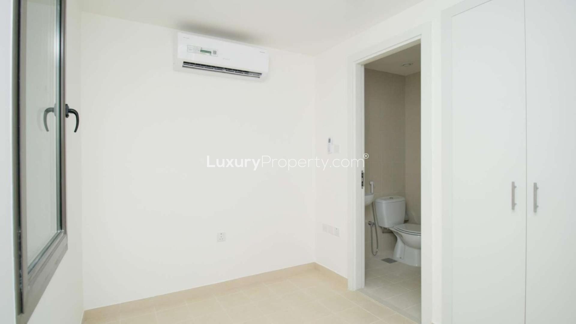 4-bedroom corner townhouse exterior in Noor Community, Town Square, large plot for sale