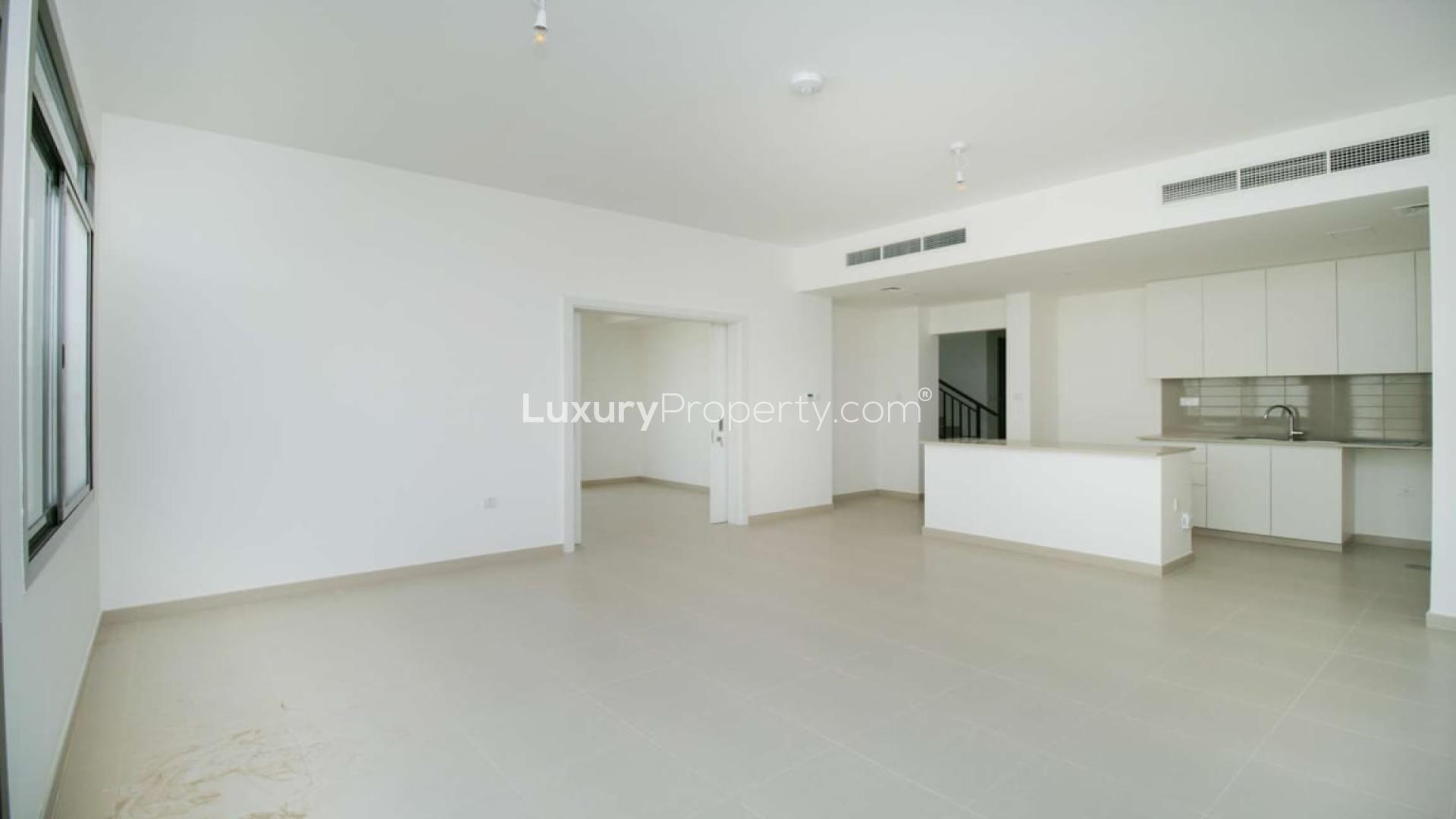 Spacious 4-bedroom corner townhouse exterior in Zahra, Town Square, available for rent