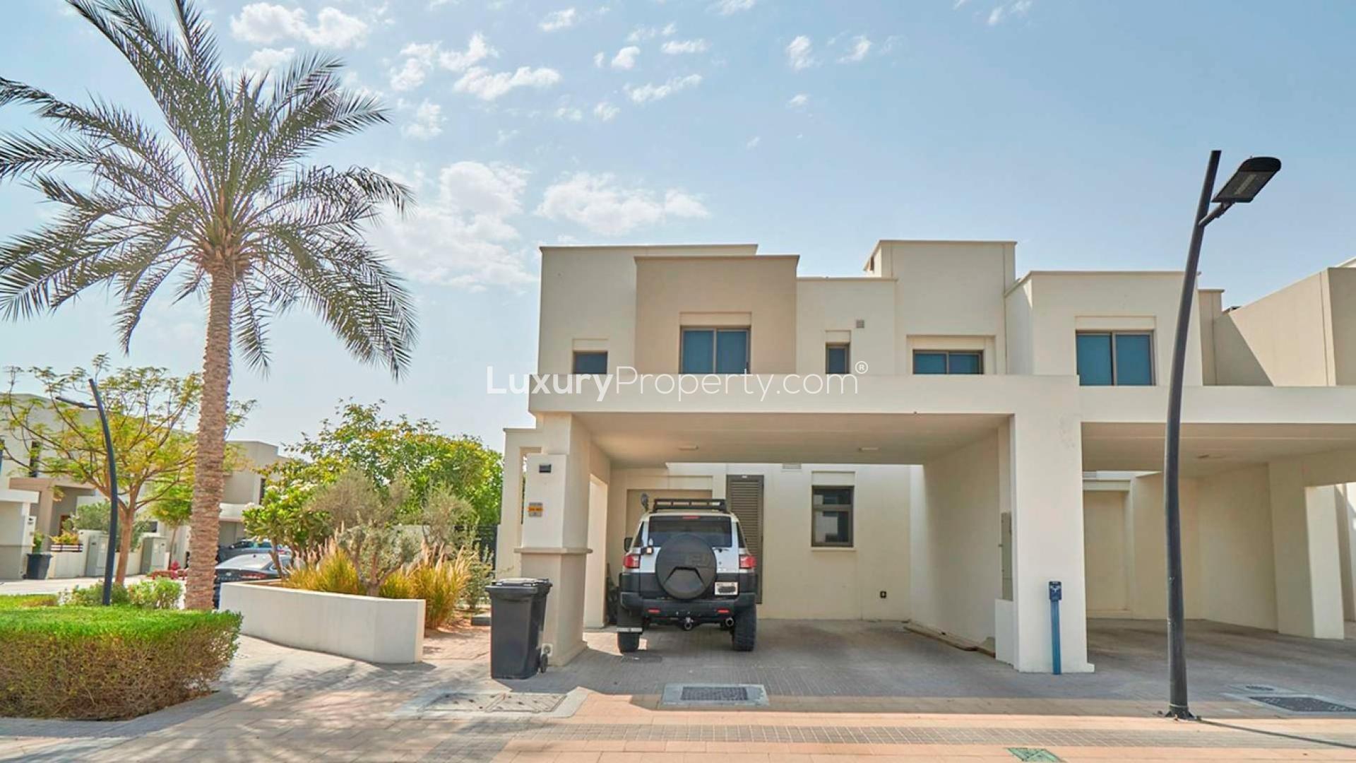 Spacious 4-bedroom villa exterior in Hayat Townhouses, Town Square, for sale