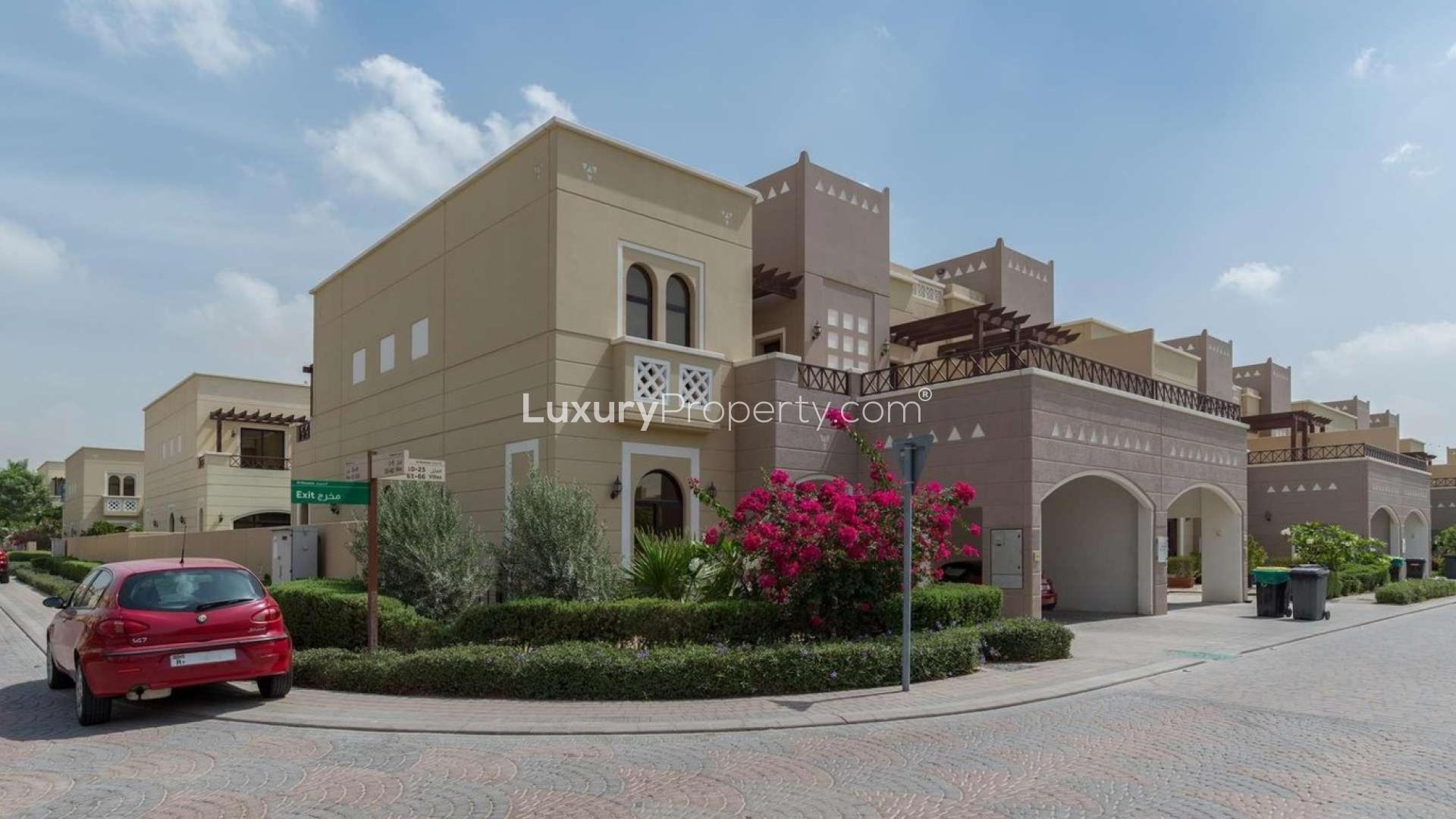 Four-bedroom corner townhouse for sale in Naseem, Mudon, with lush landscaping and spacious design