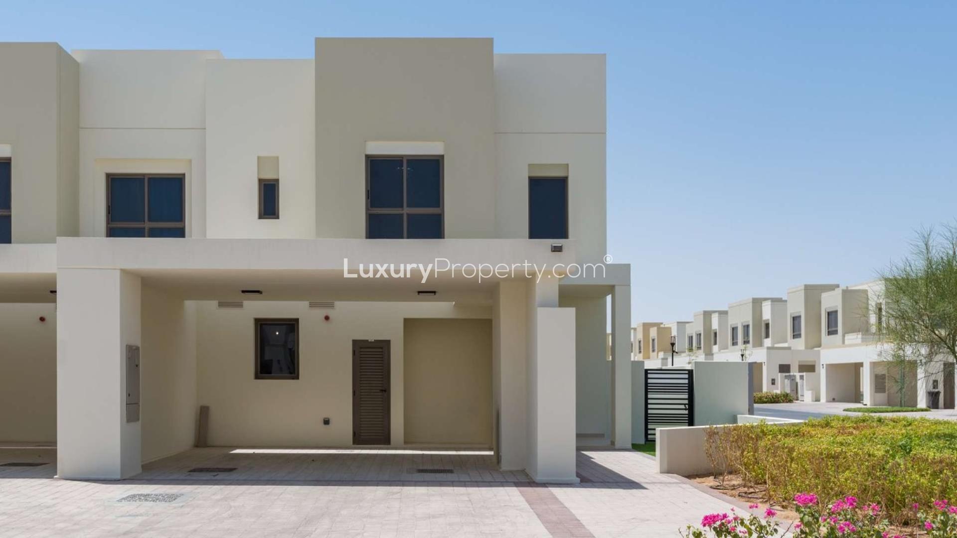 Fully furnished 4-bedroom corner townhouse exterior in Naseem Town Square, for sale