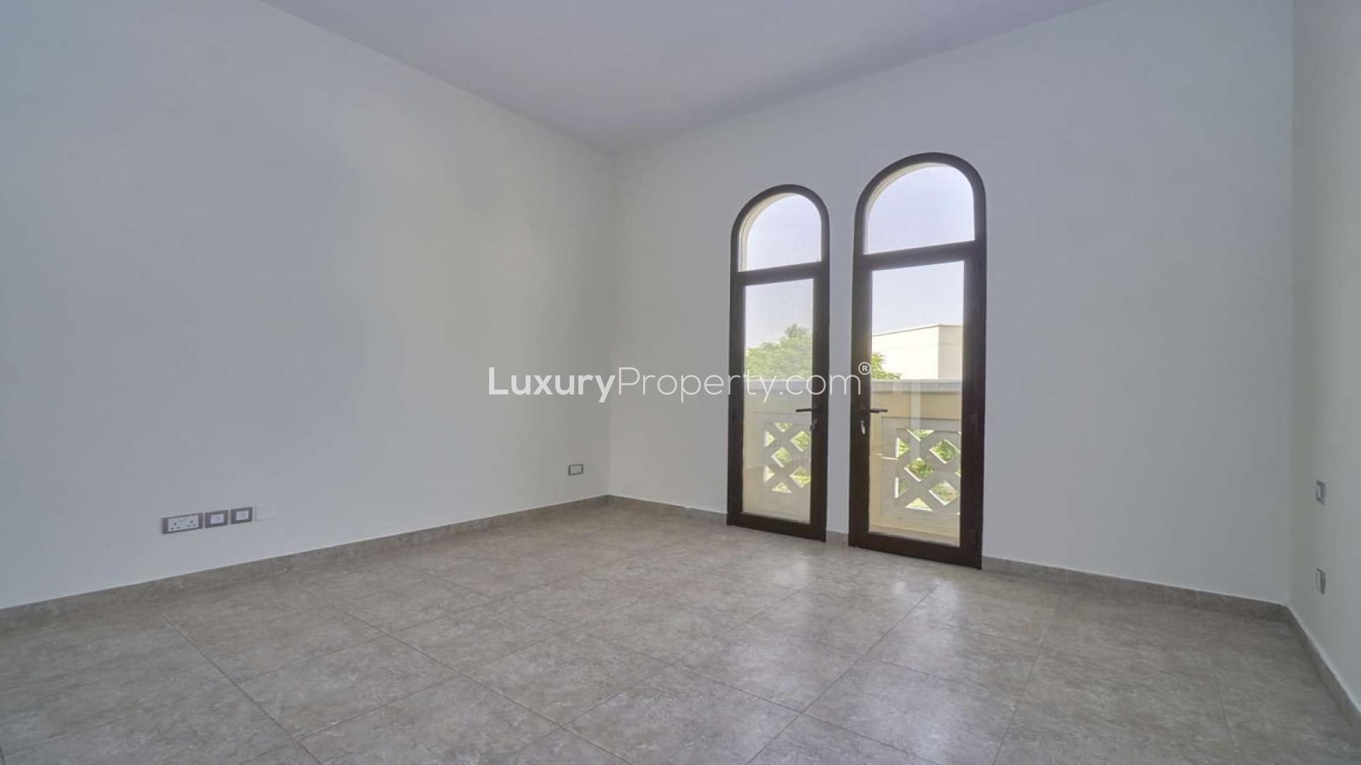 Corner townhouse with garden in Naseem, Mudon. Tenanted, four bedrooms, five bathrooms, for sale