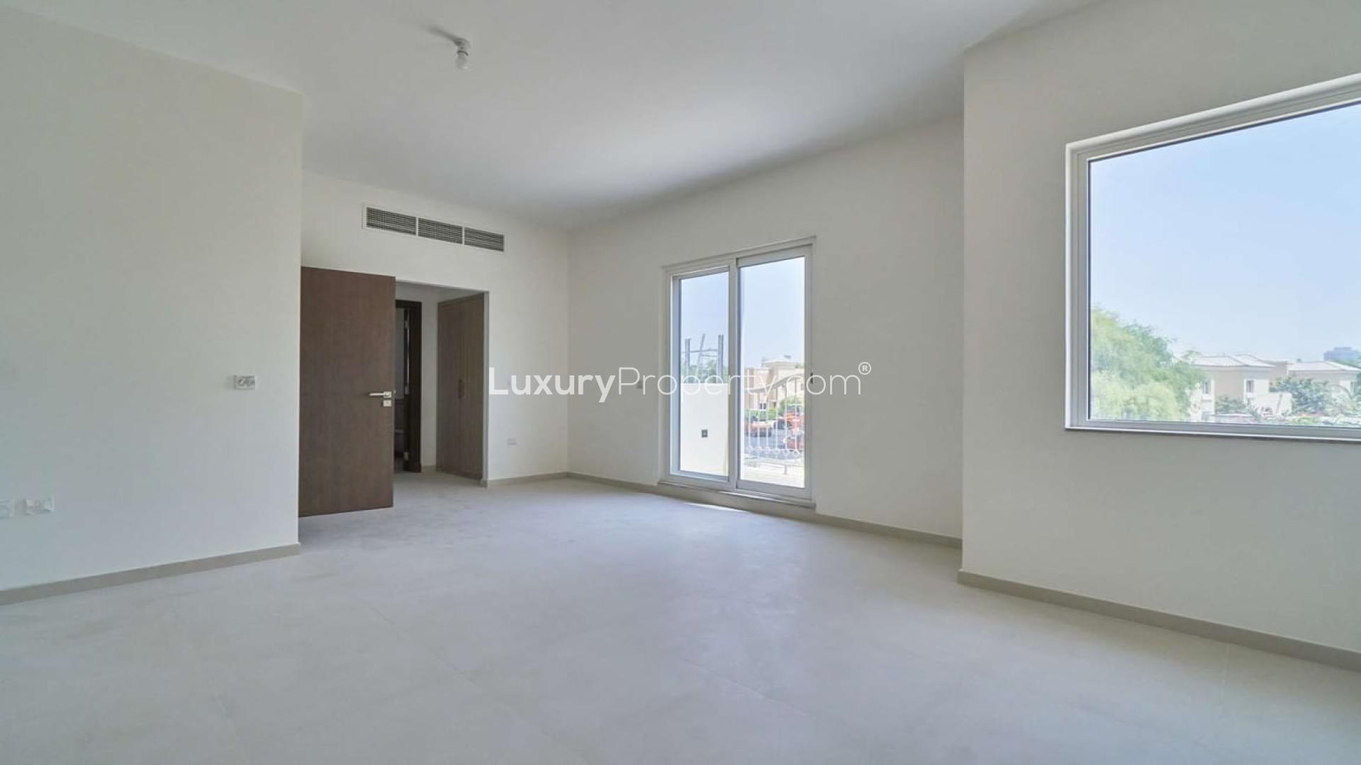 Spacious living room in Marbella Village townhouse, Dubai Sports City, available for rent