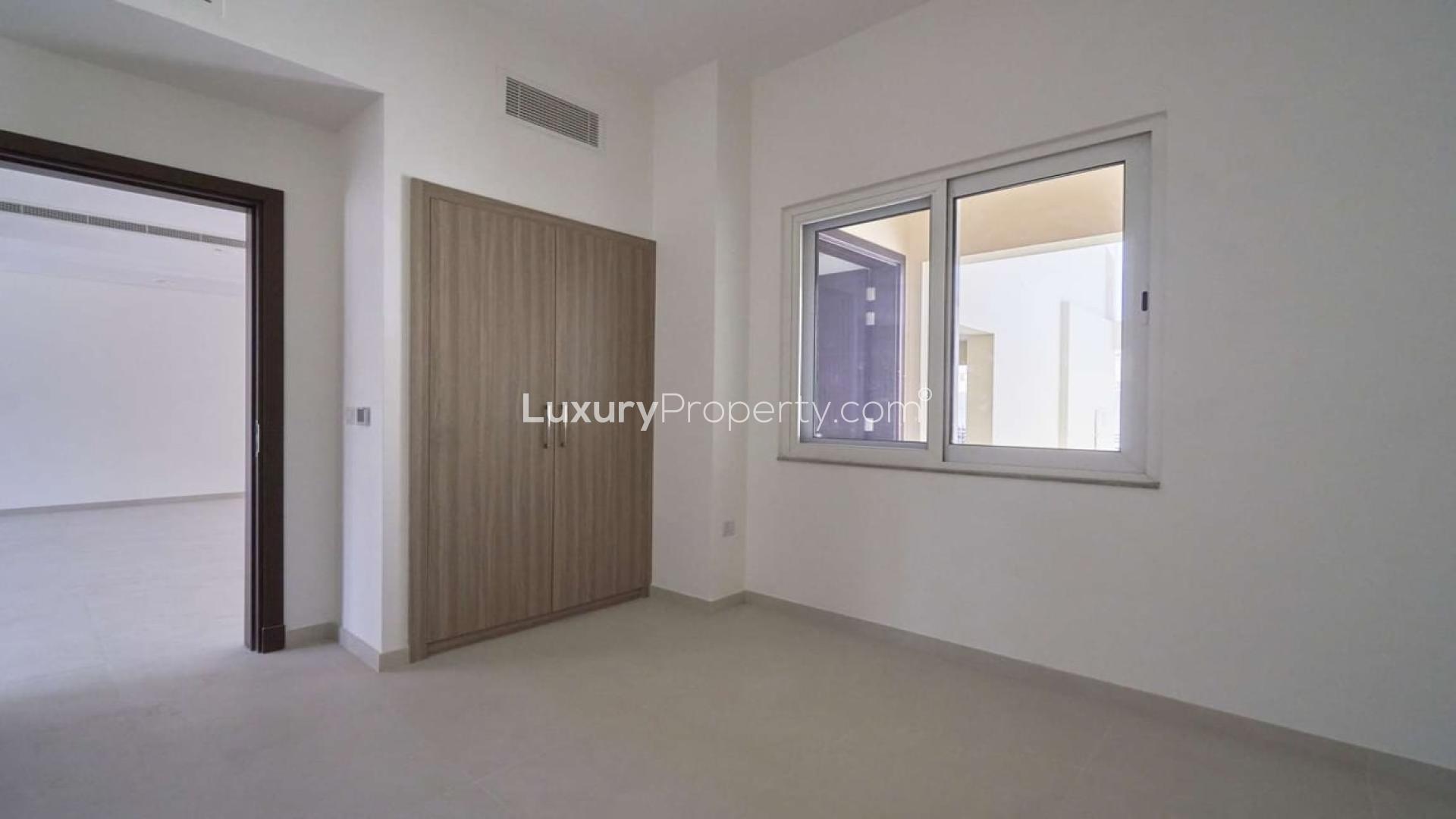Spacious living room in 4-bedroom townhouse for rent, Victory Heights, Dubai Sports City