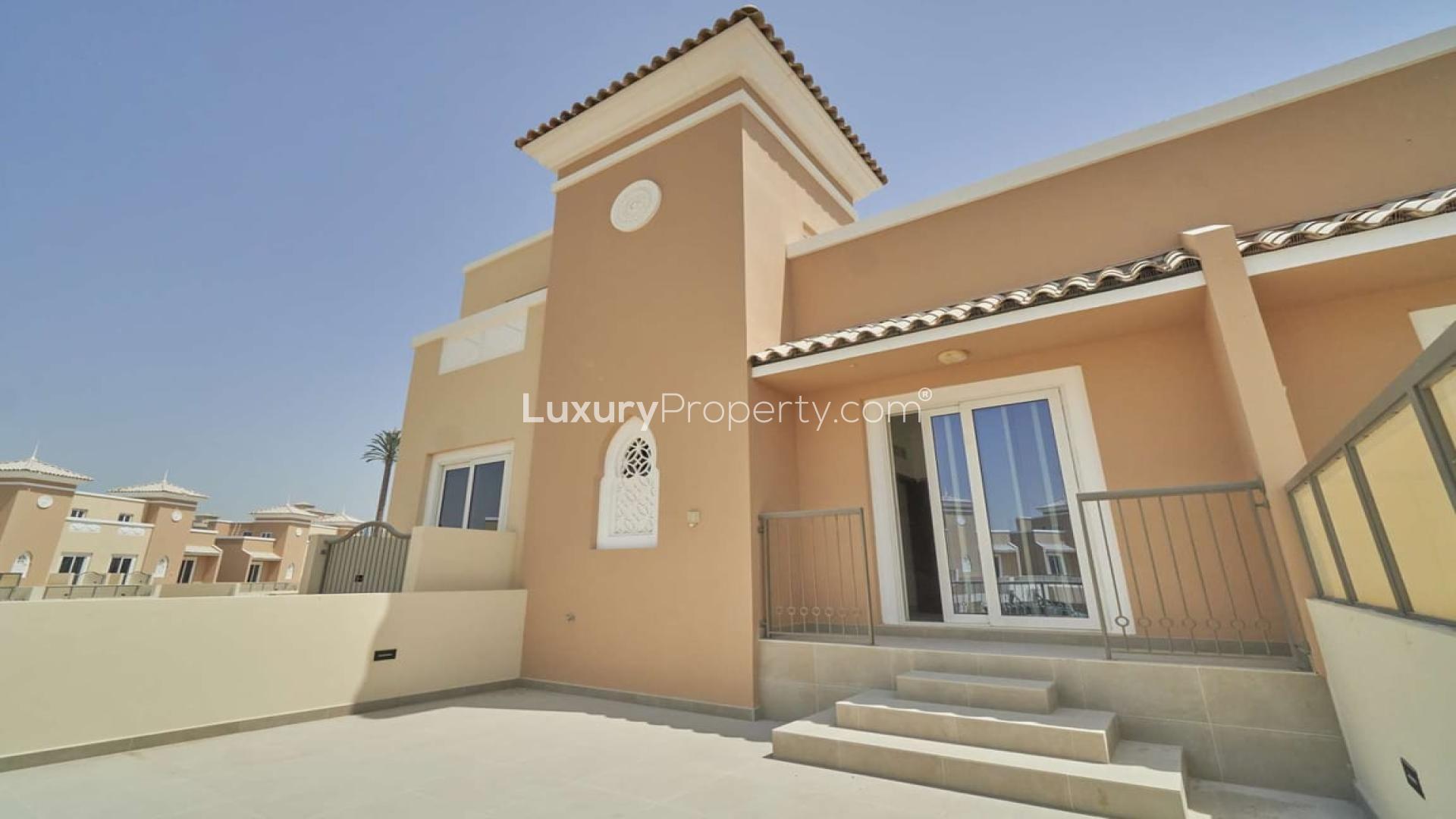 View from villa balcony in Victory Heights, Dubai Sports City, showcasing lush community surroundings