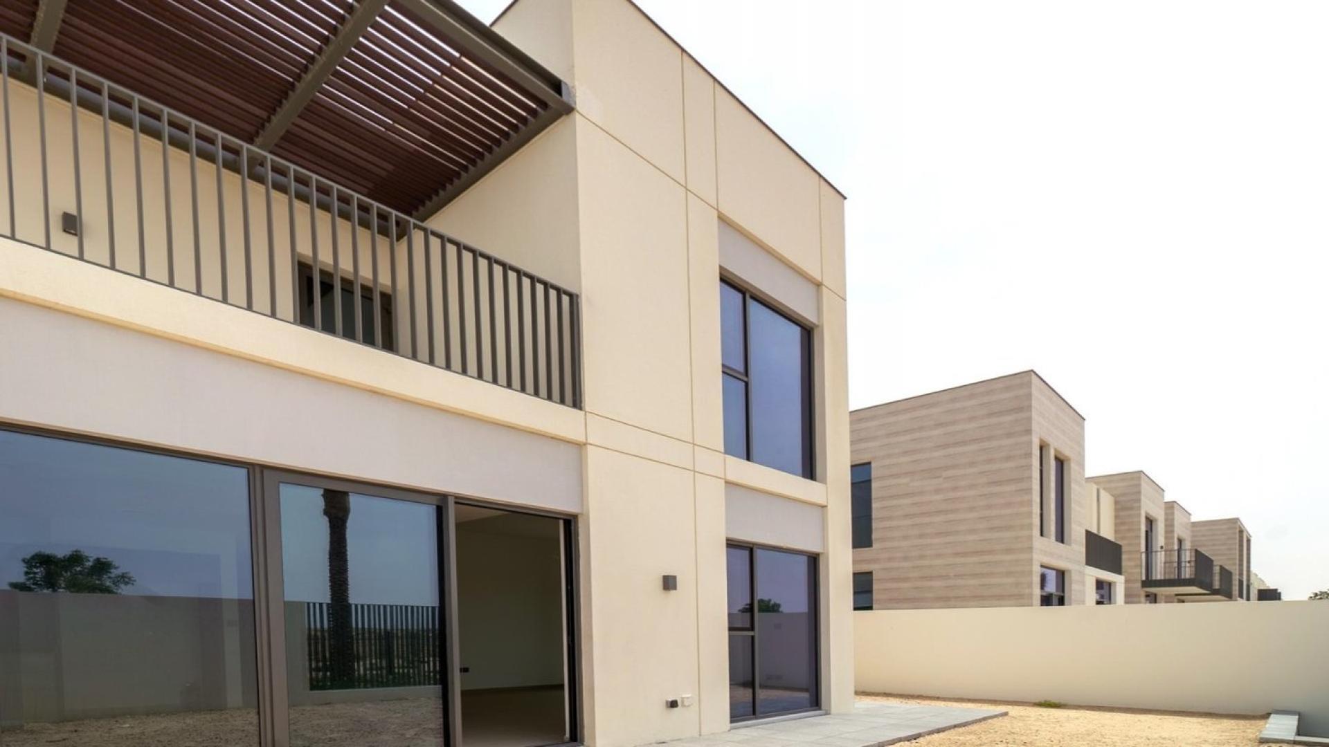 Modern living room with large windows in Arabian Ranches 3 townhouse, Joy sub-community