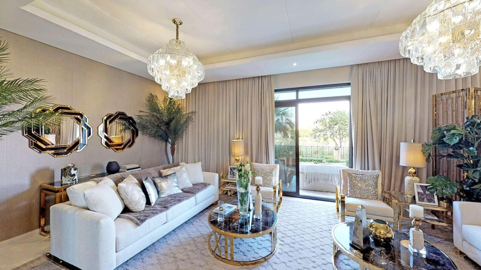 Luxurious living and dining area in Damac Hills townhouse, Park Residences, for sale