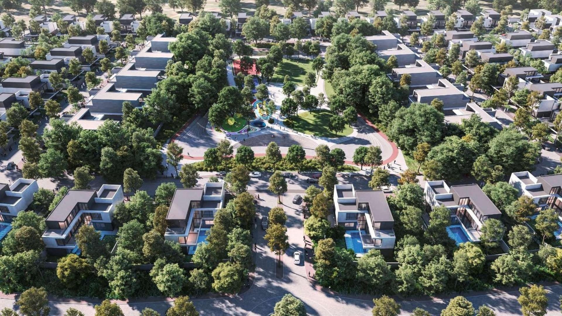 Modern living room in Jouri Hills townhouse, featuring large windows and elegant decor