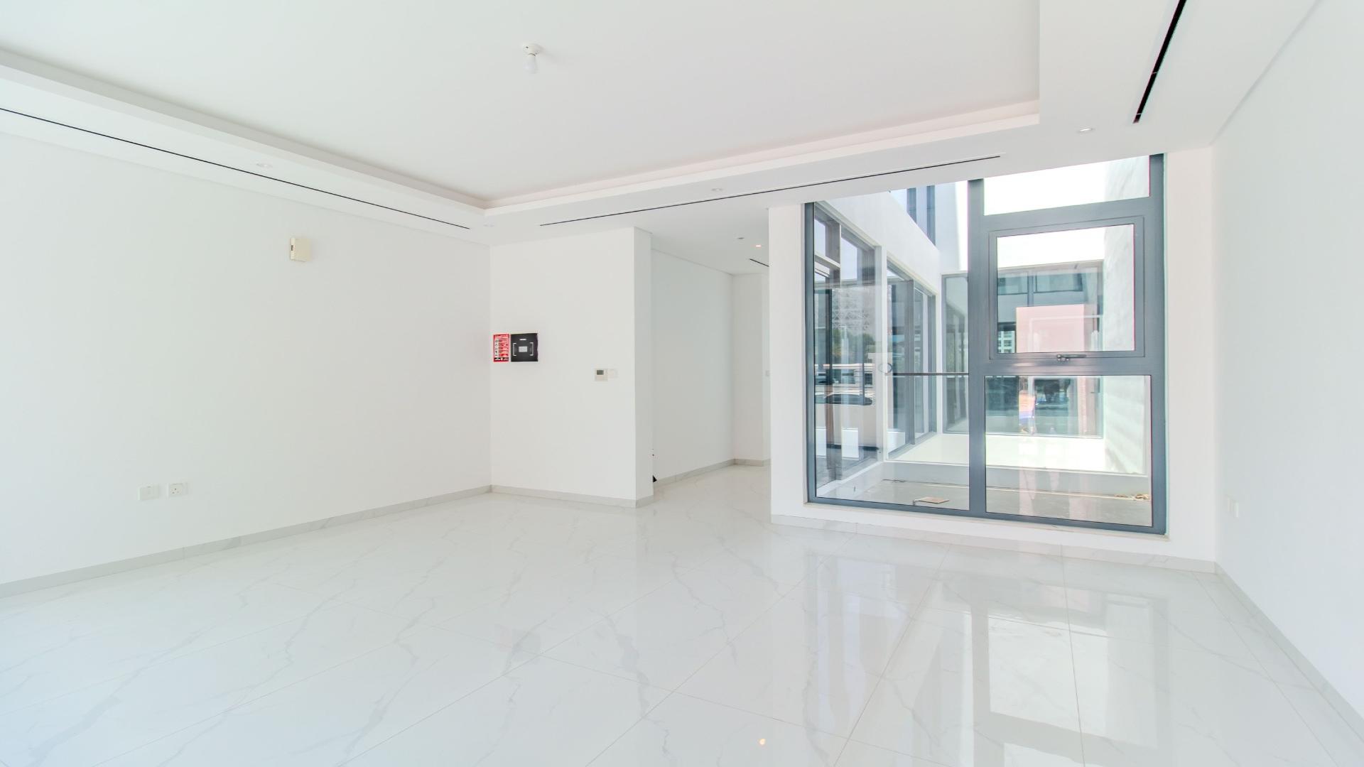 Brand new Jumeirah Village Circle townhouse with modern interior and large windows for sale