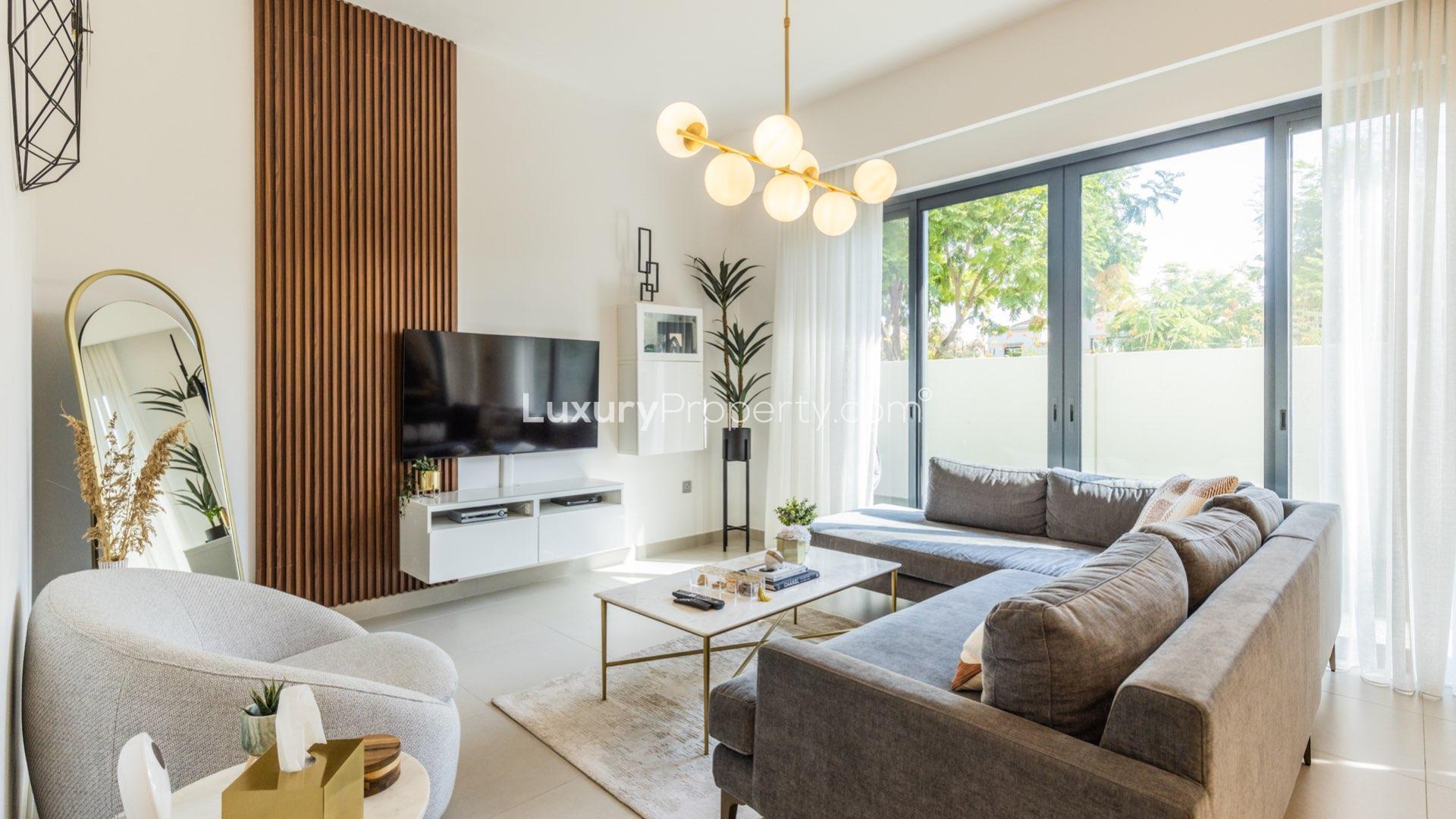 Modern living room in upgraded Camelia townhouse, Arabian Ranches 2, featuring stylish decor