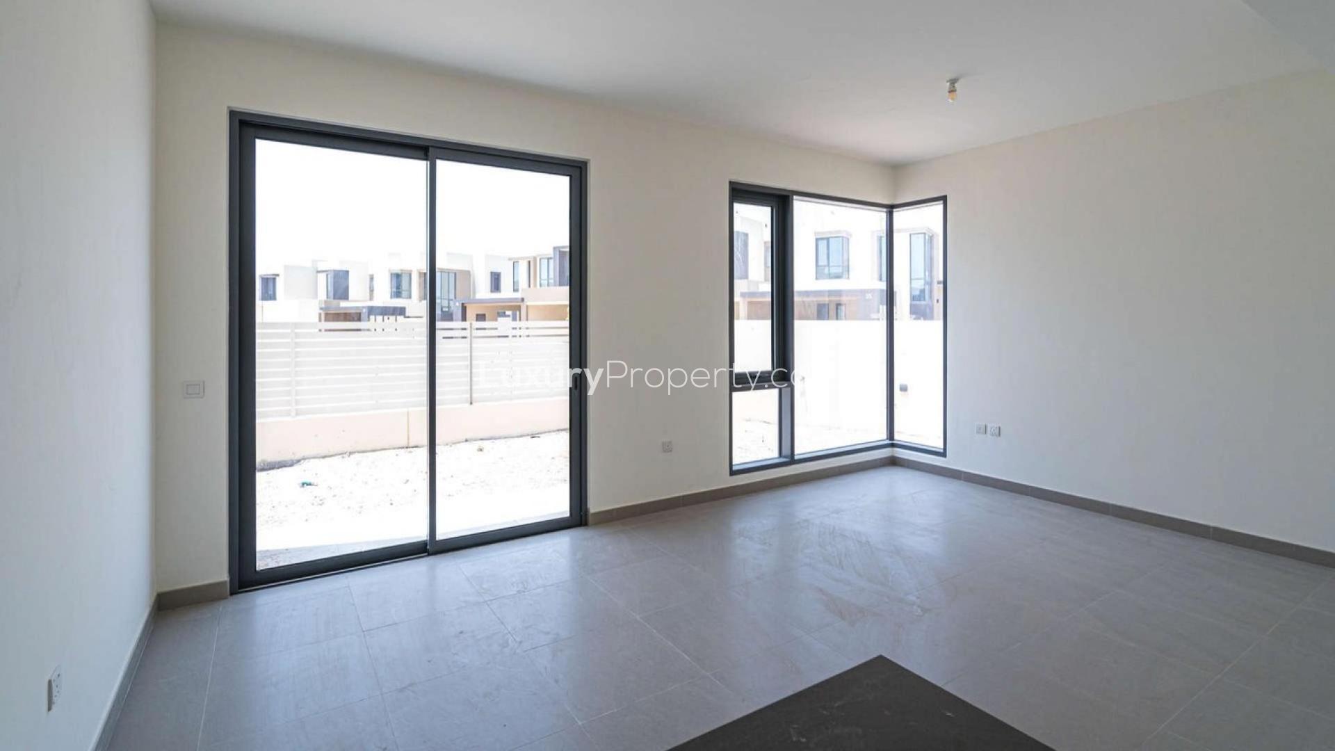 Modern four-bedroom villa exterior in Maple, Dubai Hills Estate, available for rent