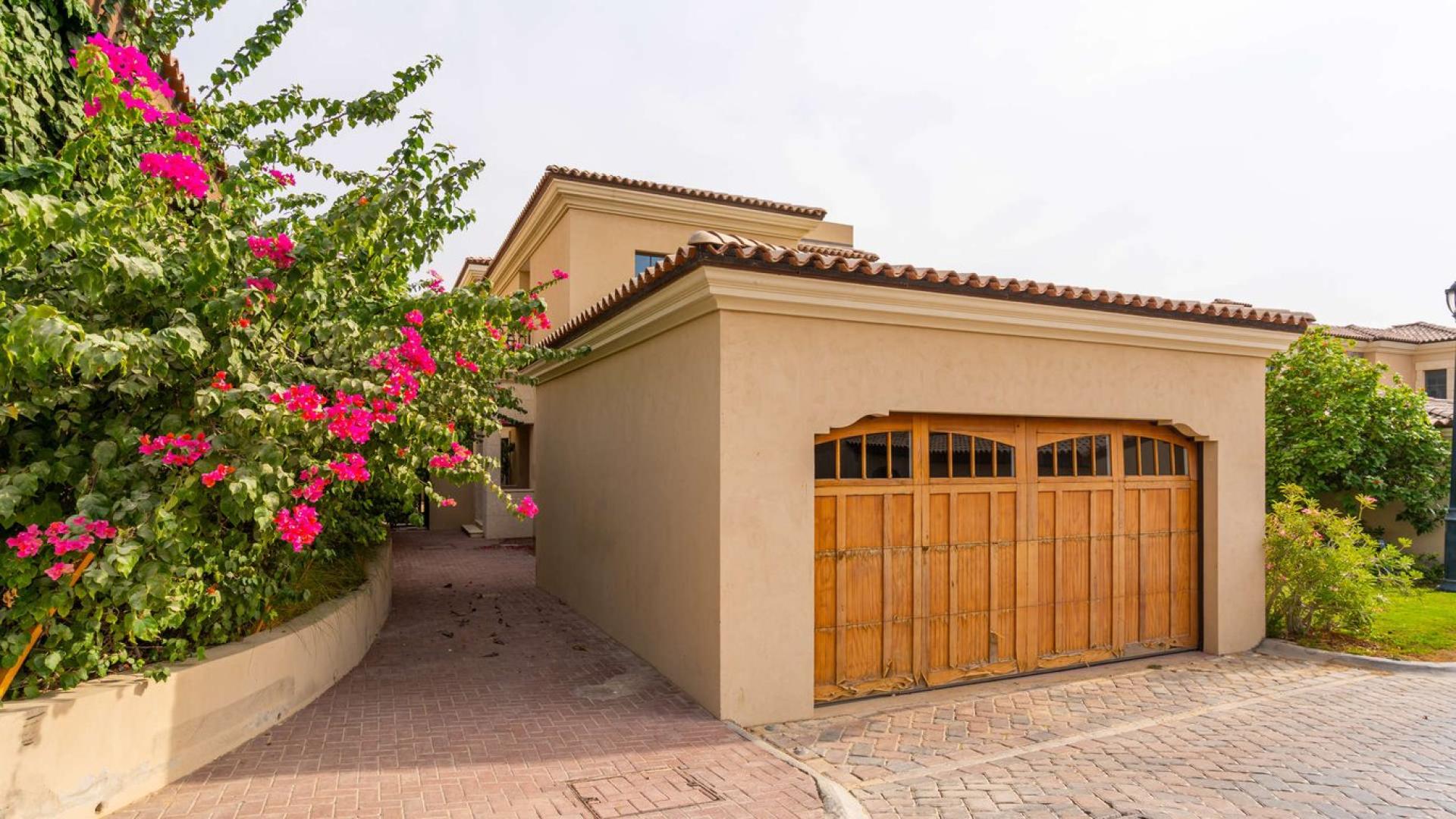 4-bedroom villa exterior, lush garden, Whispering Pines, Jumeirah Golf Estates, Dubai rental property