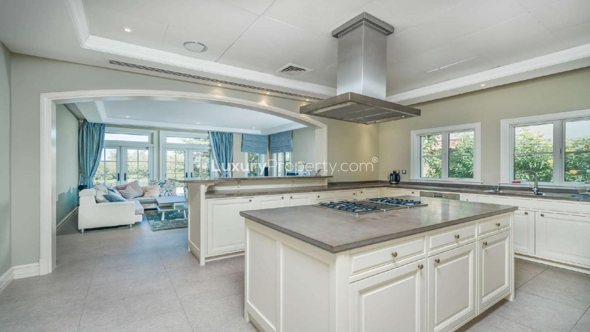 Luxurious living room in Mediterranean-style villa at Jumeirah Golf Estates, featuring elegant decor