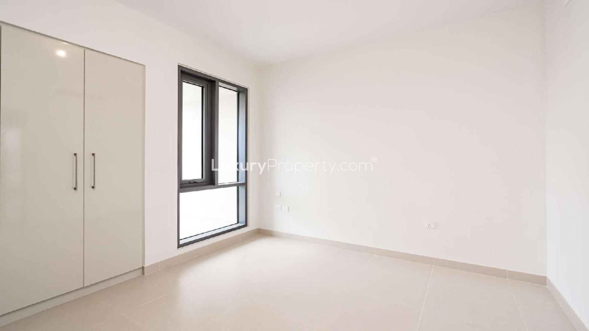 Spacious living area with large windows in Maple 2 villa, Dubai Hills Estate