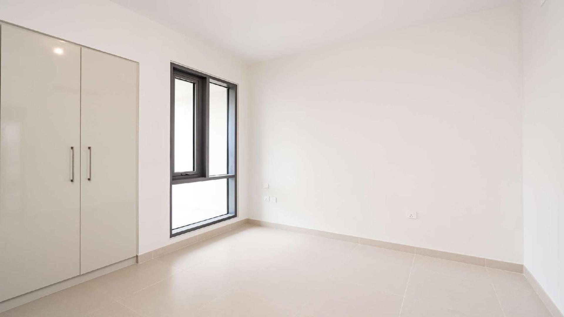 Spacious living area with large windows in Maple 2 villa, Dubai Hills Estate