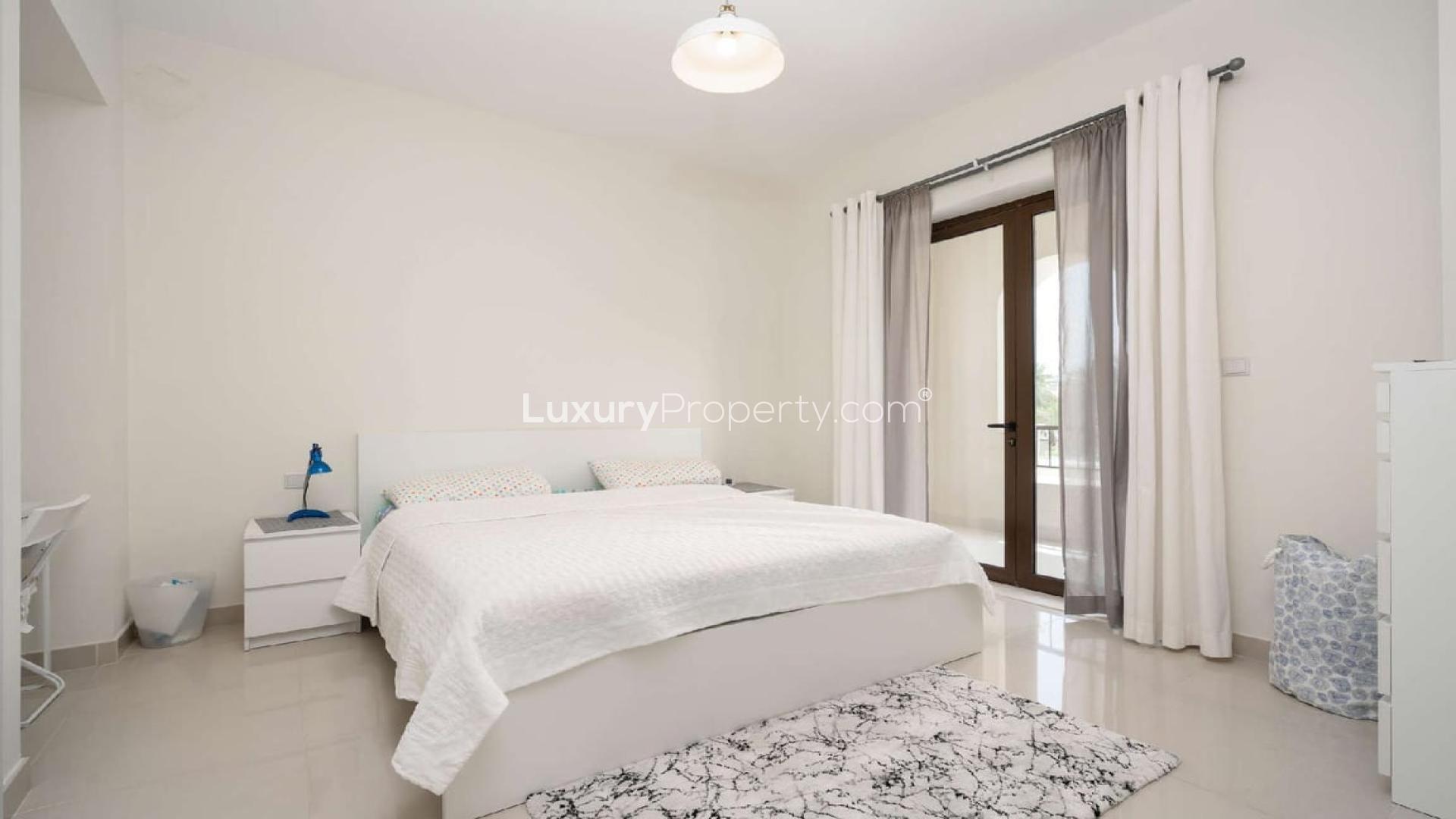 Landscaped 4-bedroom villa exterior with garage in Samara, Arabian Ranches 2 for rent