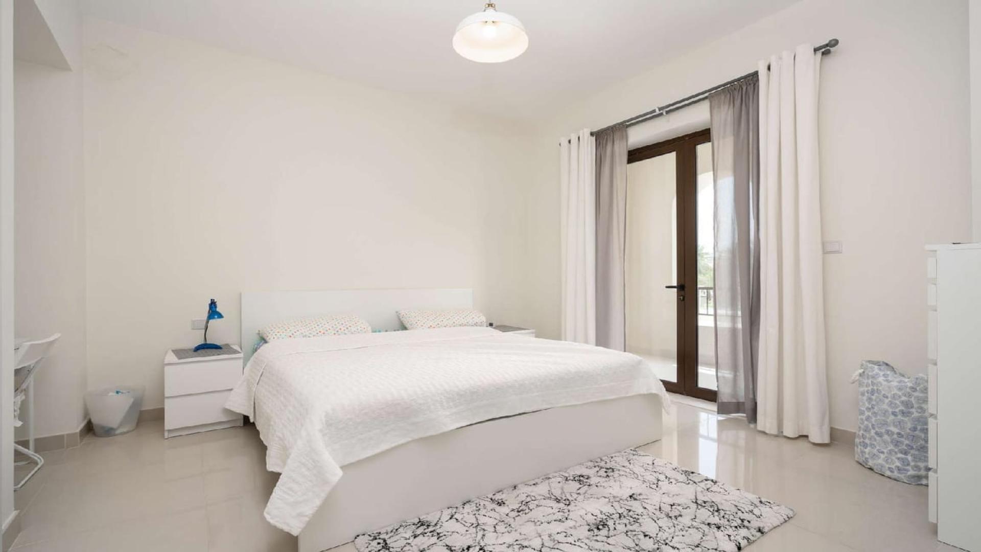 Landscaped 4-bedroom villa exterior with garage in Samara, Arabian Ranches 2 for rent