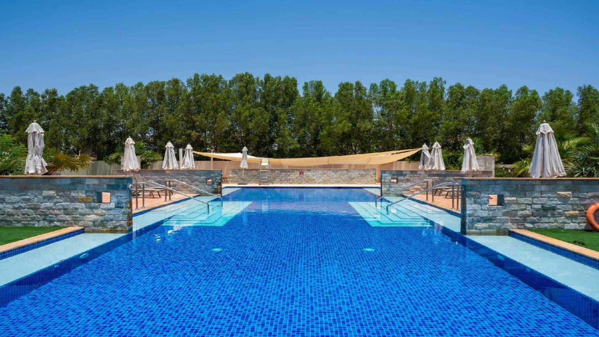 Spacious living room in 3-bedroom villa at Al Habtoor Polo Club, Dubai Land