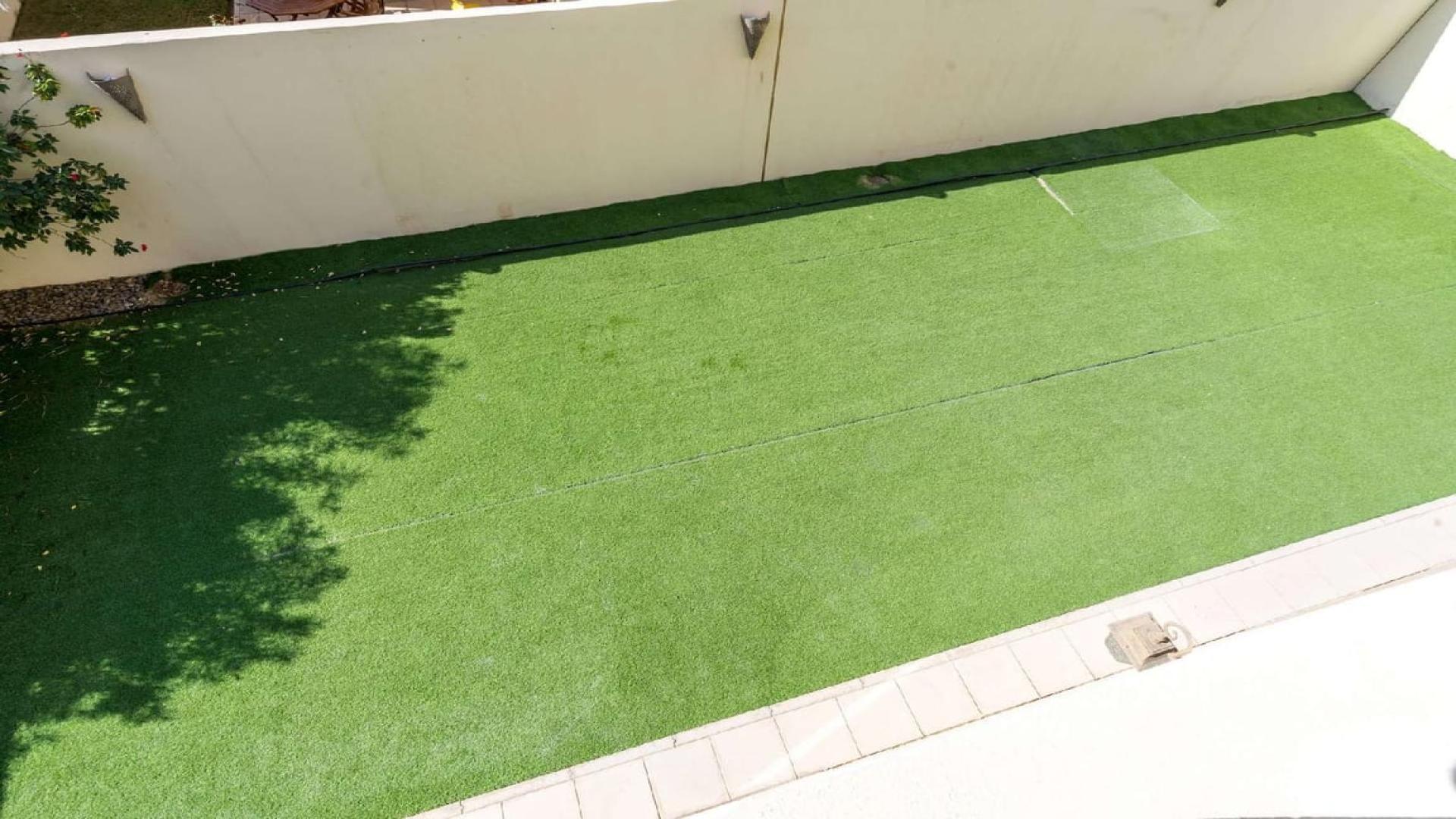 Exterior view of 4-bedroom villa in Casa, Arabian Ranches 2, with garden