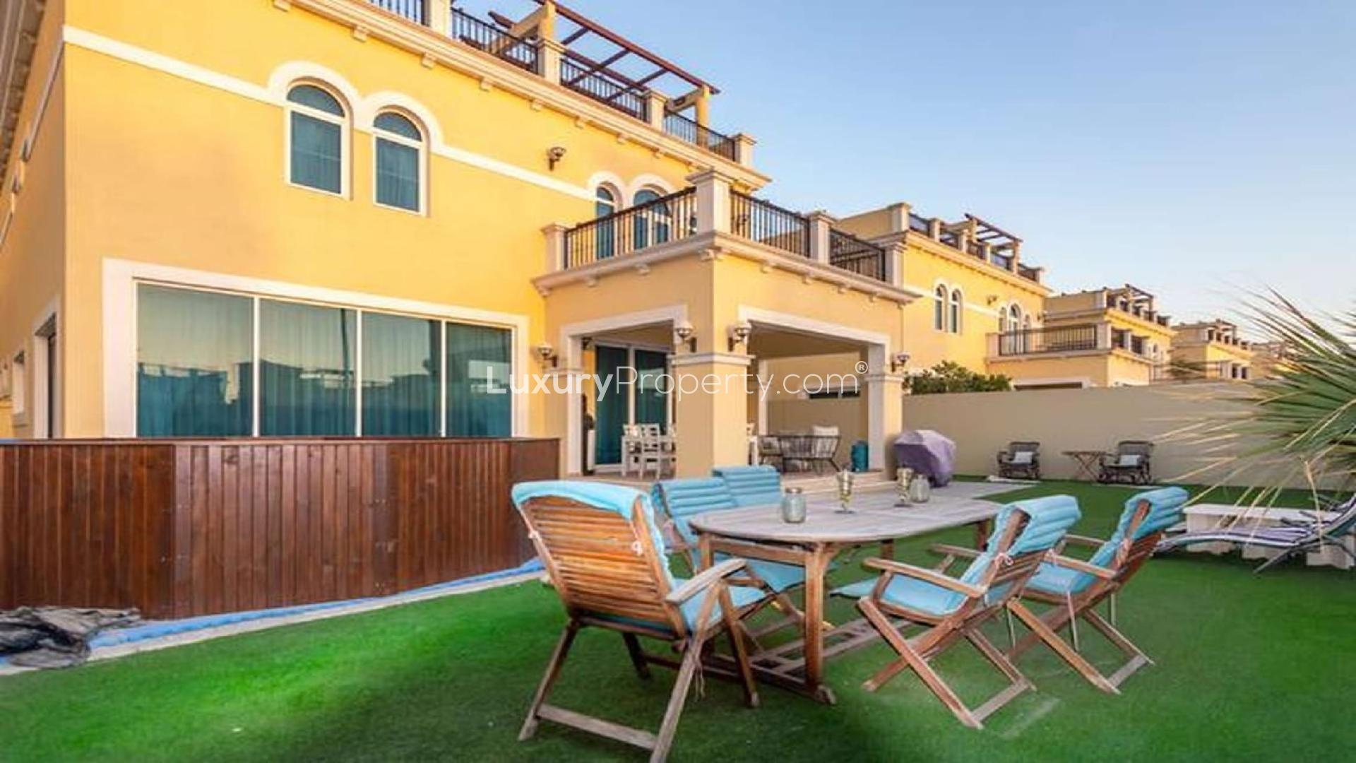 Exterior view of Legacy Nova Villa with patio in Jumeirah Park, available for rent