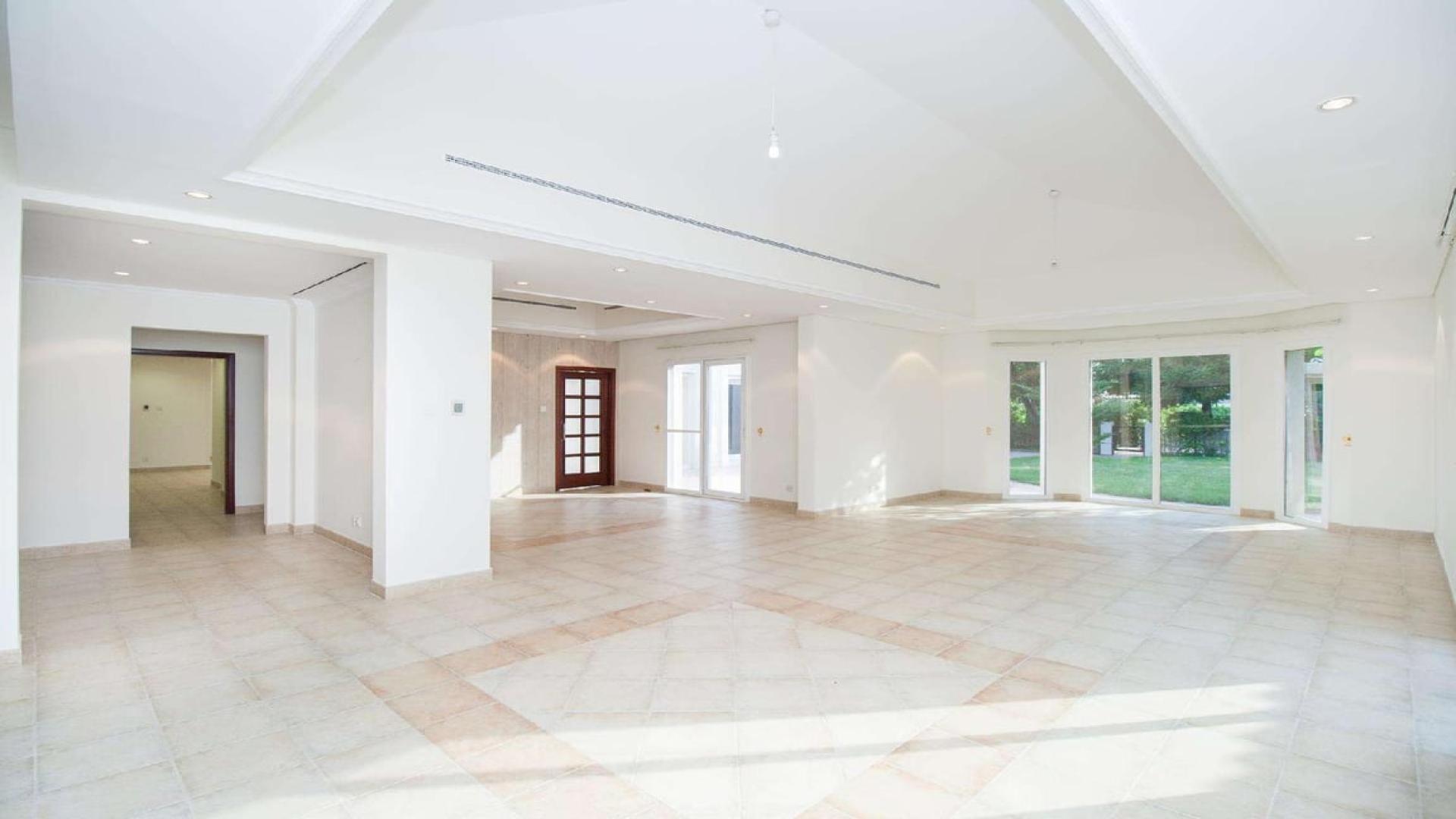 Immaculate 4-bedroom bungalow entrance with lush garden in Green Community Motor City