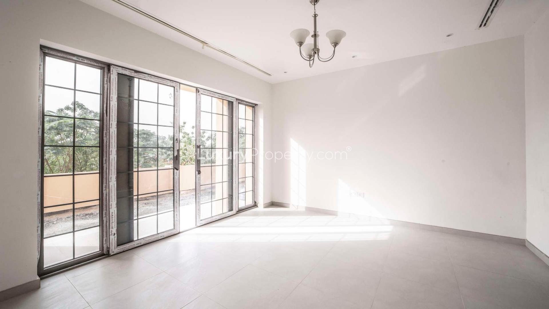 Elegant living area in 4-bedroom villa, Whispering Pines, Jumeirah Golf Estates, spacious and bright