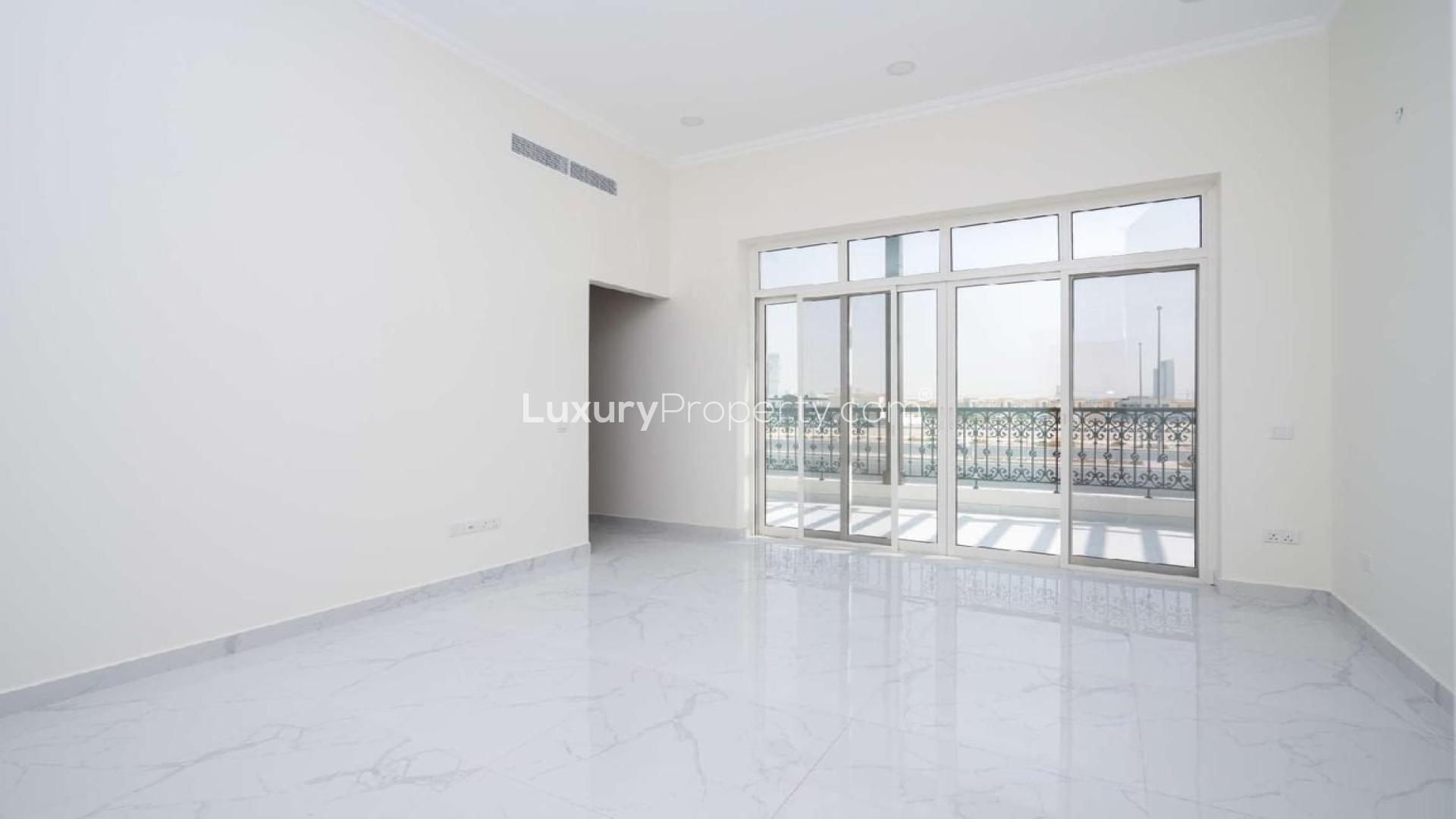 N/A,Bright living room with marble flooring in Jumeirah Park villa for rent